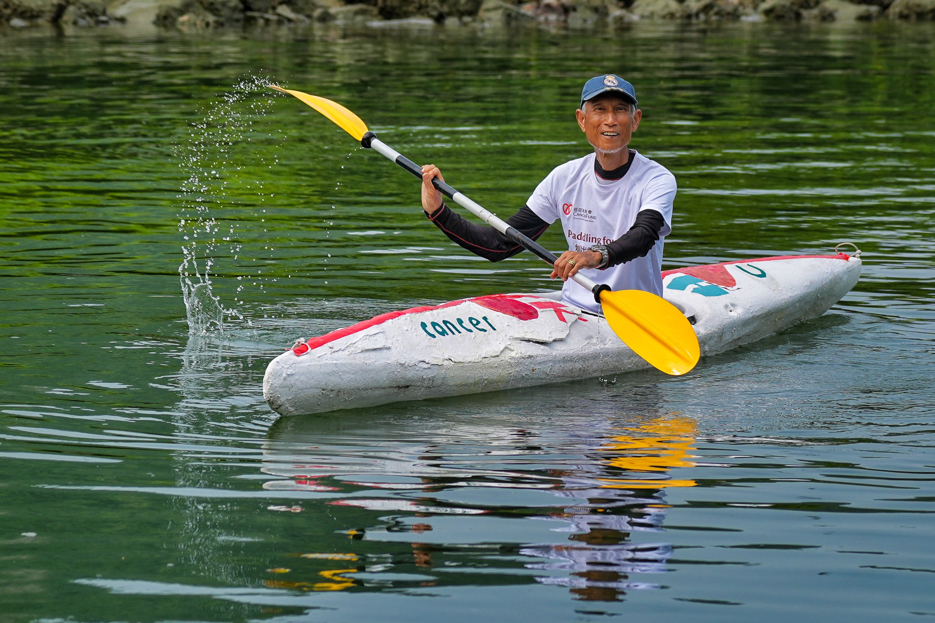 After surviving liver cancer, Raymond Lo, 75, is preparing to paddle 65km to raise funds and awareness for other patients. Photo: Elson Li
