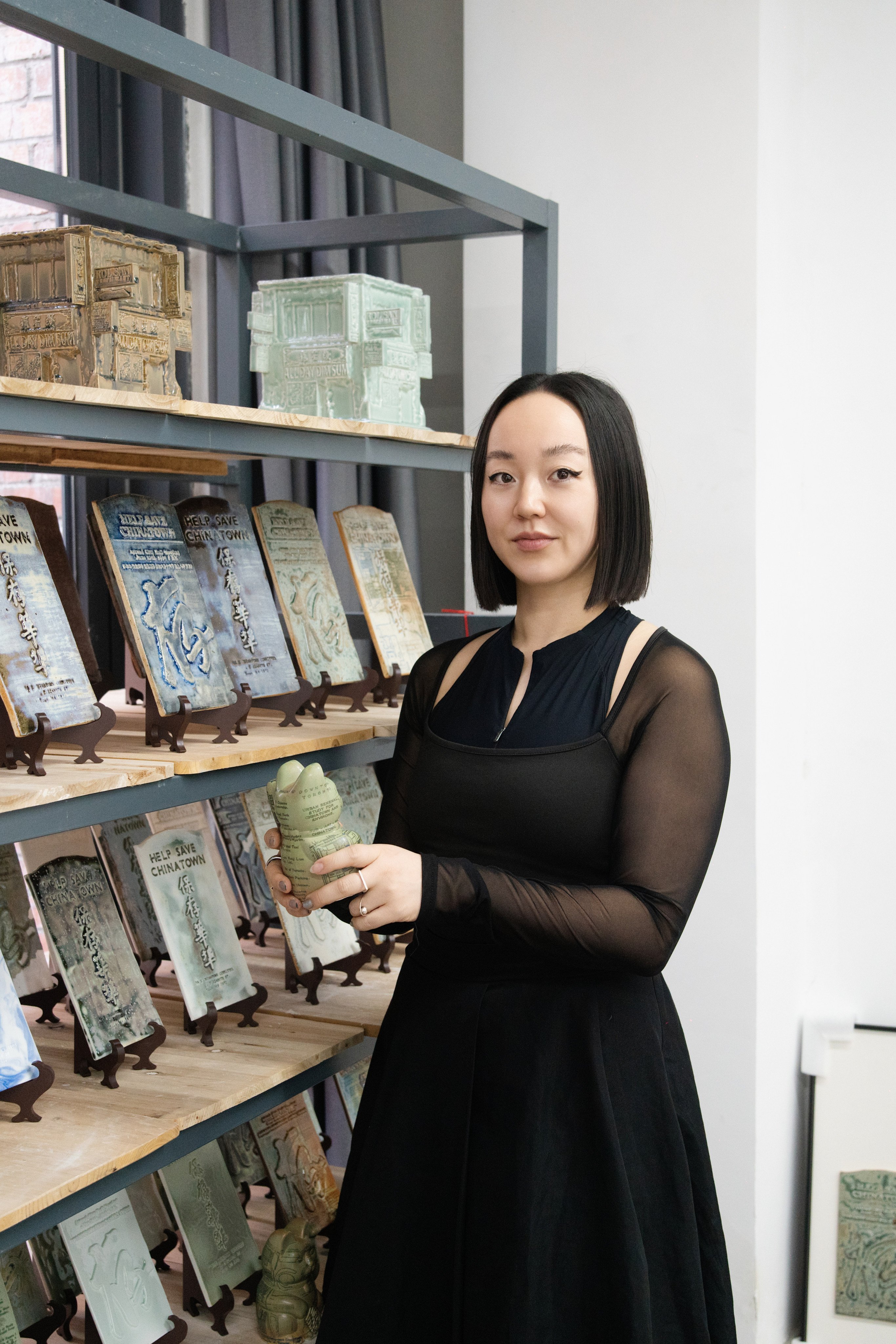 Architect and artist Linda Zhang with “ancestral tablets” she made in Jingdezhen, in China’s Jiangxi province, as part of initiatives to document the history of Toronto's Chinatown. Photo: Chuan Fa