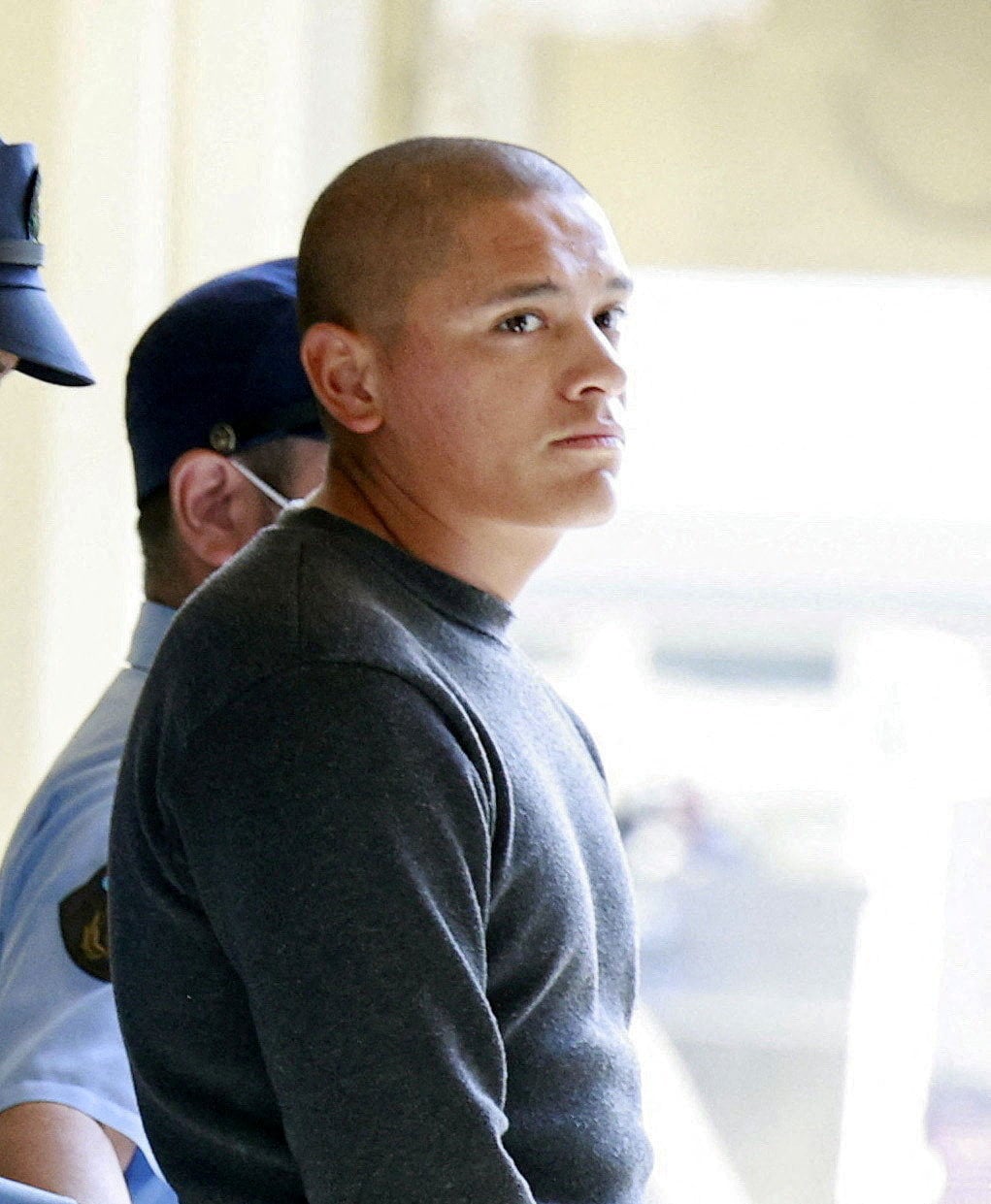 US marine lance corporal Devin Jacob Ballard leaves a police station on Monday to be sent to prosecutors over the killing of a Japanese woman in Naha, Okinawa, Japan. Photo: Kyodo/Reuters