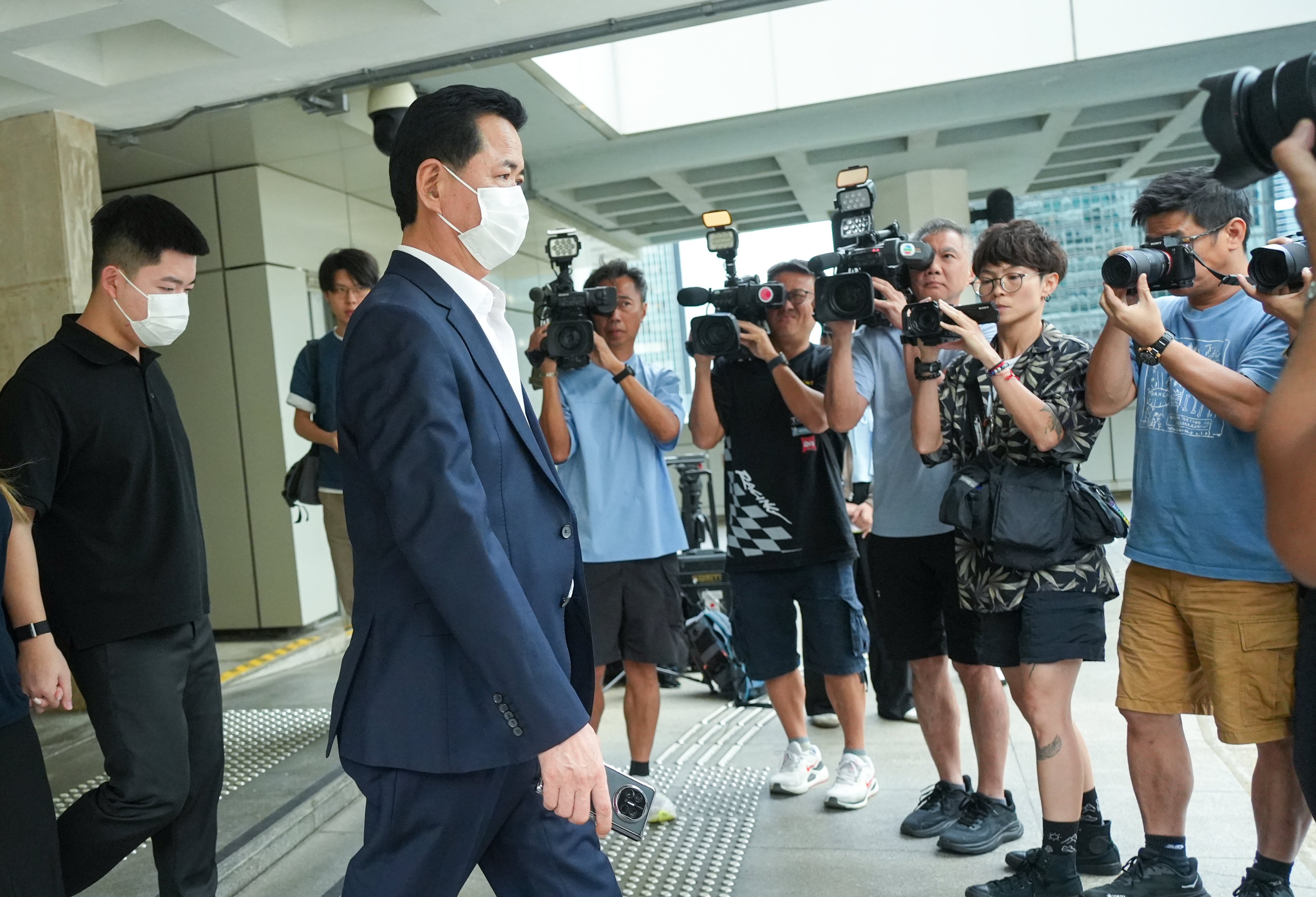 Choi Cho-san, the stepfather of slain model Abby Choi, leaves the High Court in Admiralty on Monday. Photo: Sun Yeung