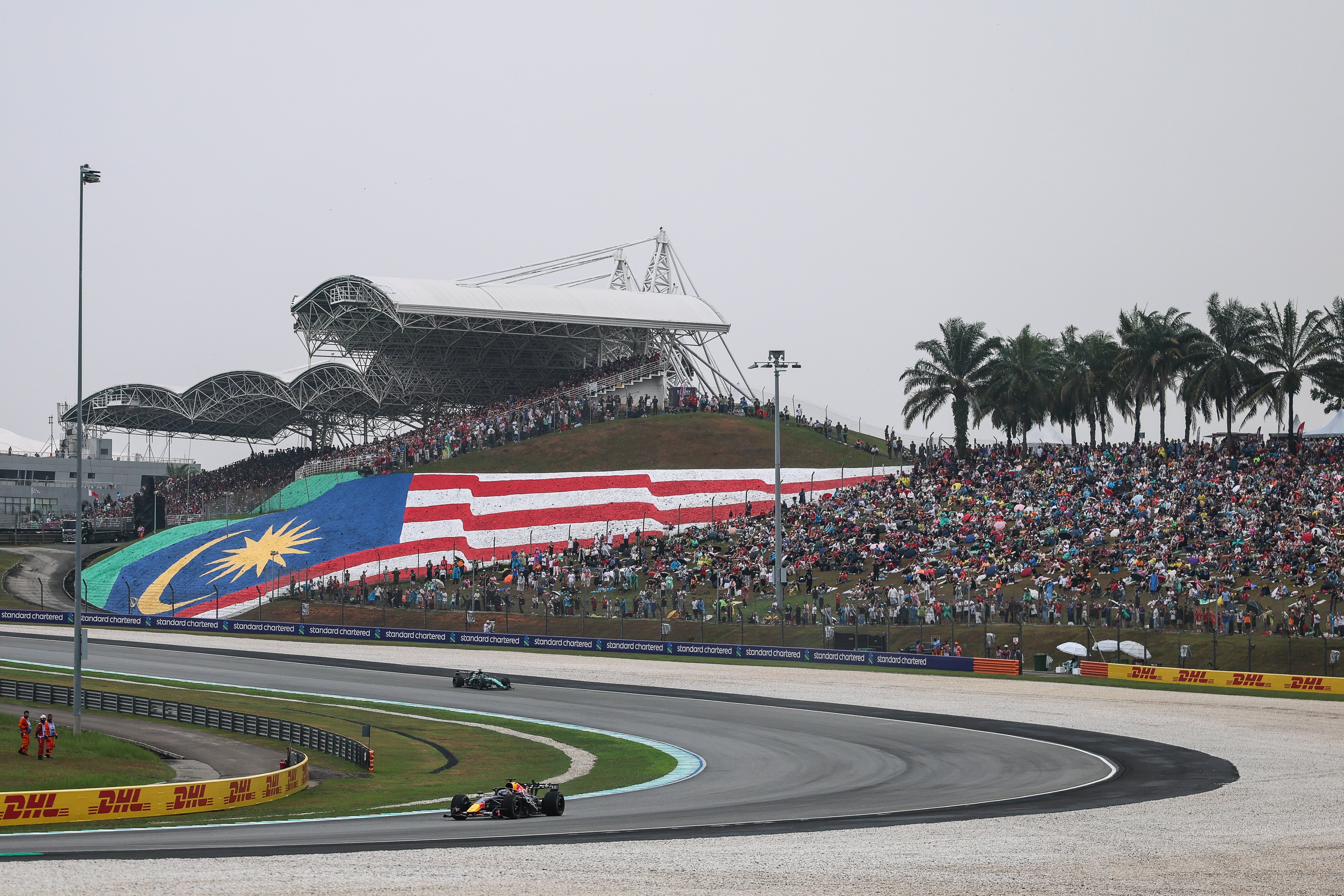 Red Bull’s Max Verstappen of the Netherlands leads the pack at Sepang International Circuit on Sunday. Photo: Xinhua