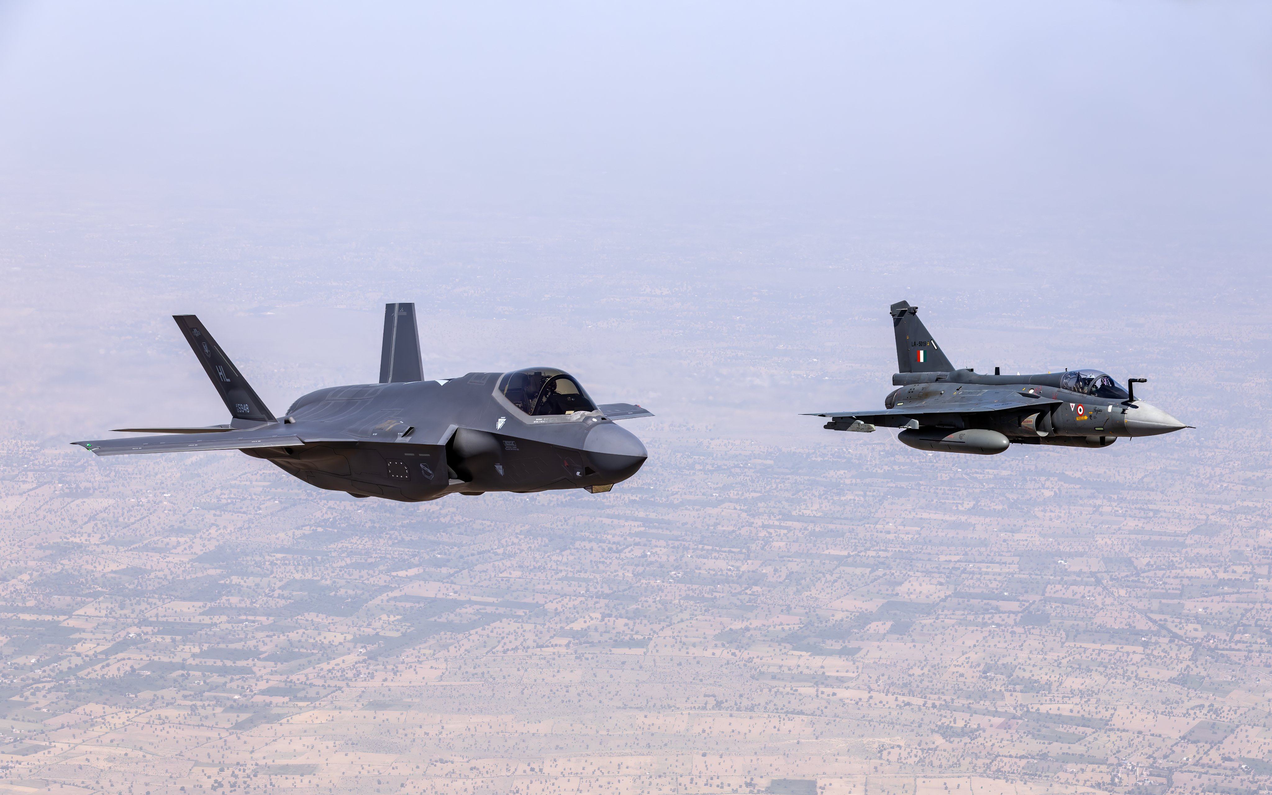 A US F-35 Lightning II (left) flies alongside an Indian Air Force HAL Tejas during Exercise Tarang Shakti 2026. Photo: Instagram/IndianAirForce