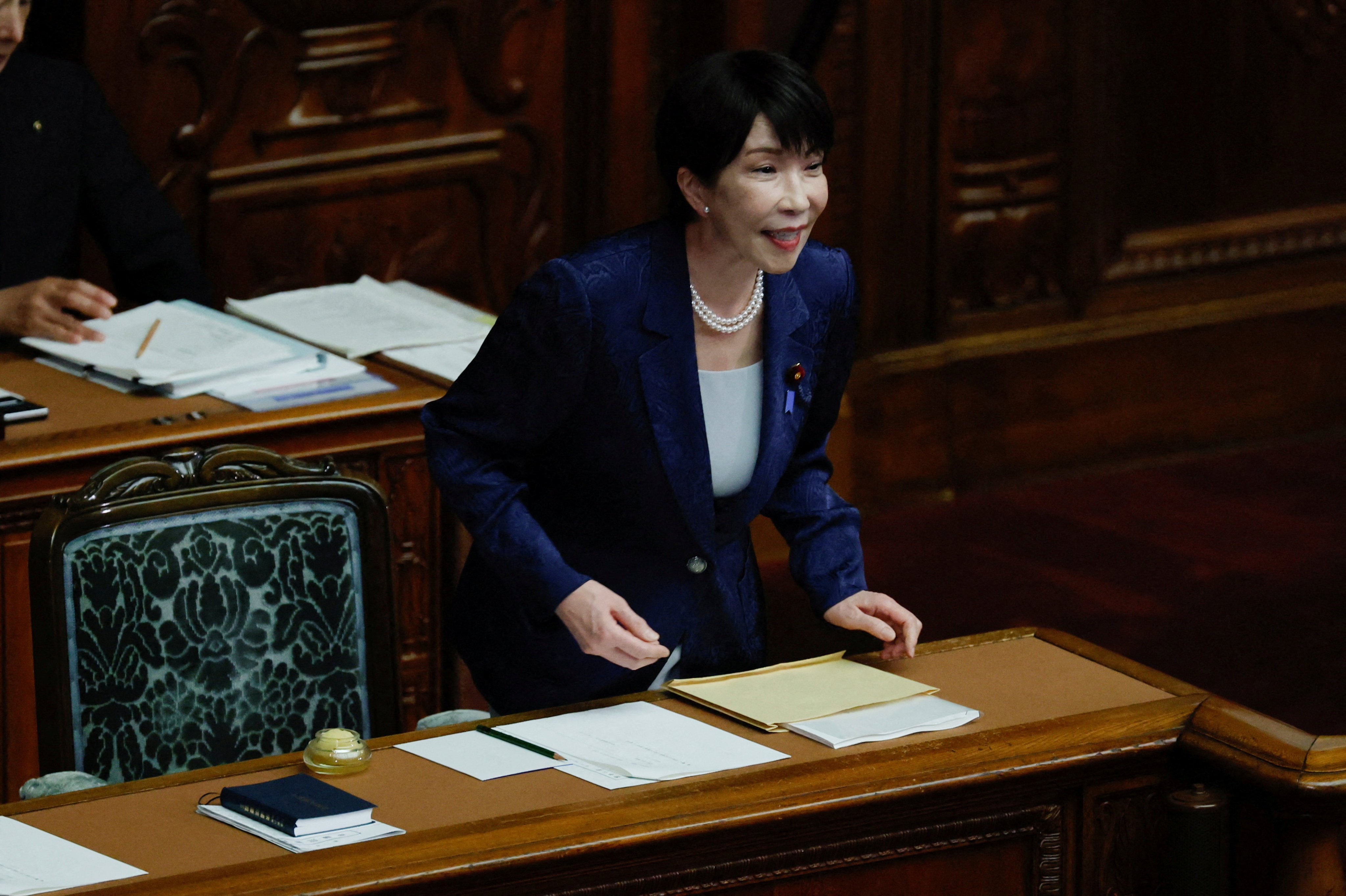 Japan’s Prime Minister Sanae Takaichi prepares to deliver her policy speech at parliament in Tokyo on Monday. Photo: Reuters