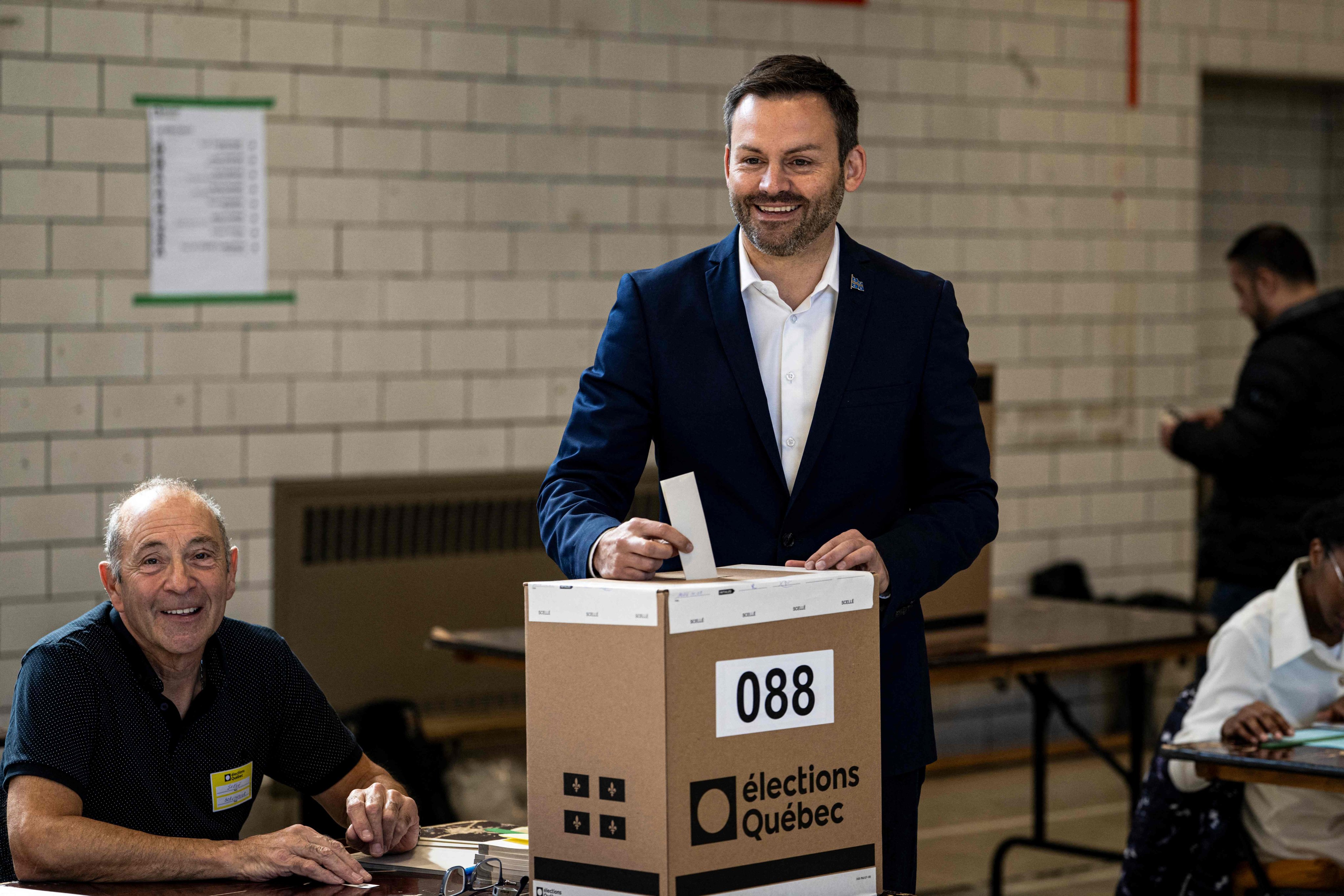 Paul St-Pierre Plamondon, leader of the Parti Quebecois (PQ), casts his vote during Quebec provincial general elections in Montreal, Quebec, Canada on Monday. Photo: AFP