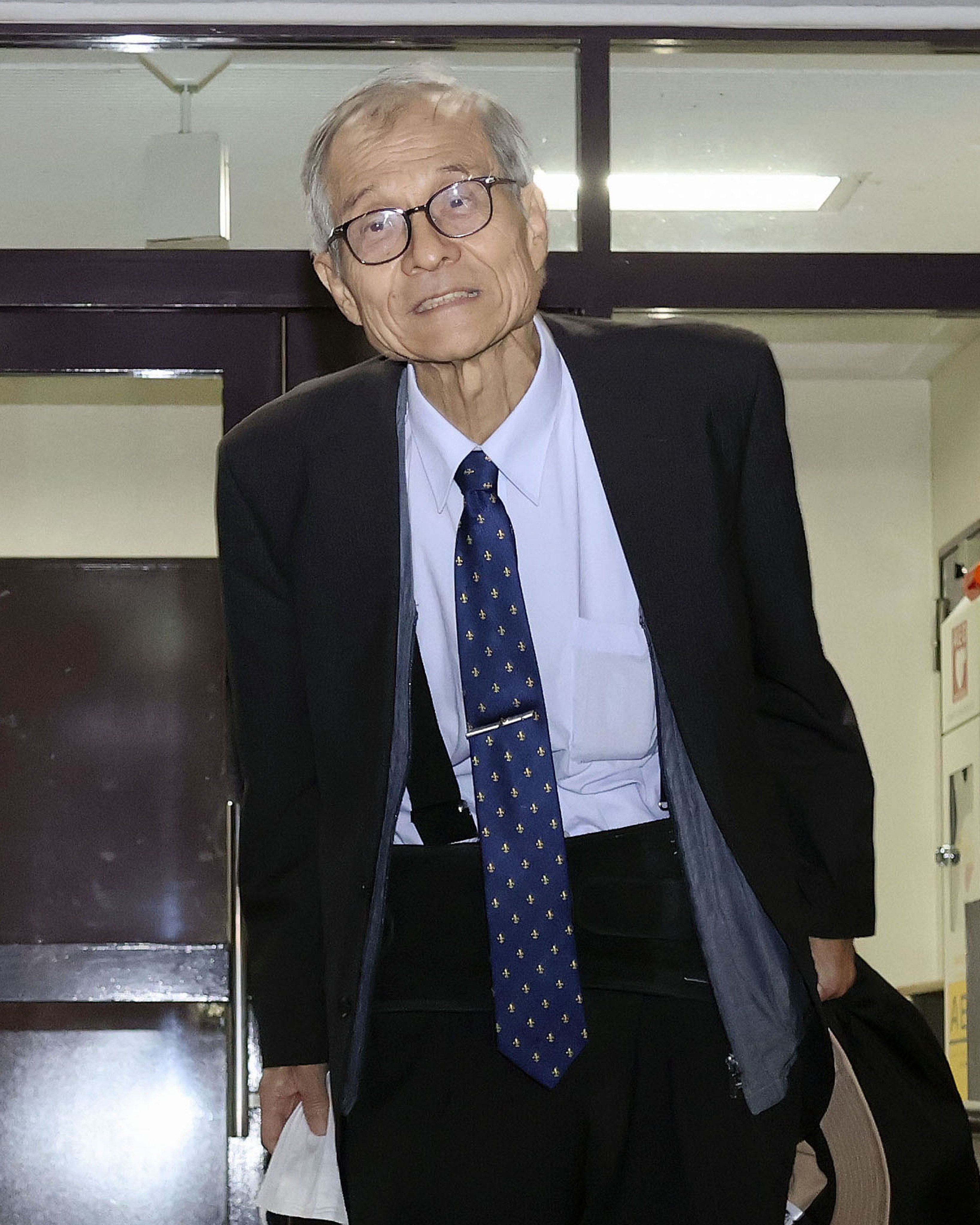 Japanese chemist Kenso Soai, who won the 2026 Nobel Prize in Chemistry, leaves home for a press conference, in Shiki, Saitama prefecture, on Wednesday. Photo: Kyodo News via AP