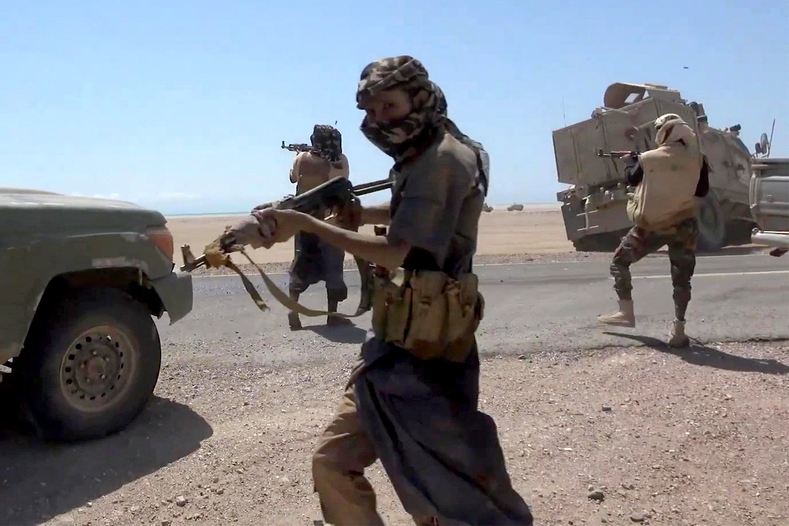 A video screengrab released by the pro-Yemeni government Southern Giants Brigades on Tuesday shows fighters during clashes with Houthis near the Bab al-Mandeb Strait in Taiz province. Photo: Yemen Giants Brigades Media Centre / AFP