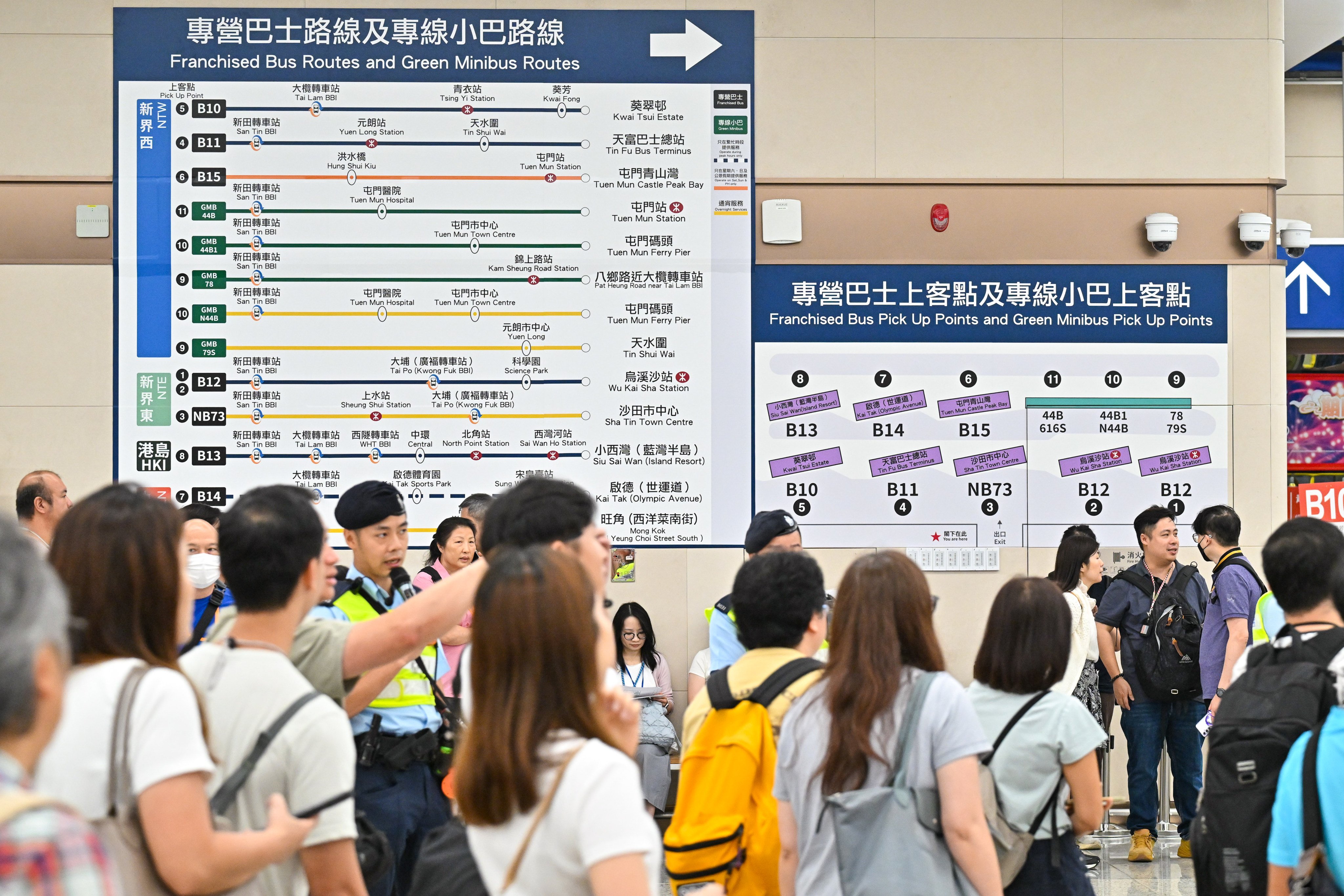 Large signs indicate where to locate different public bus routes at the Huanggang Port. Photo: Handout