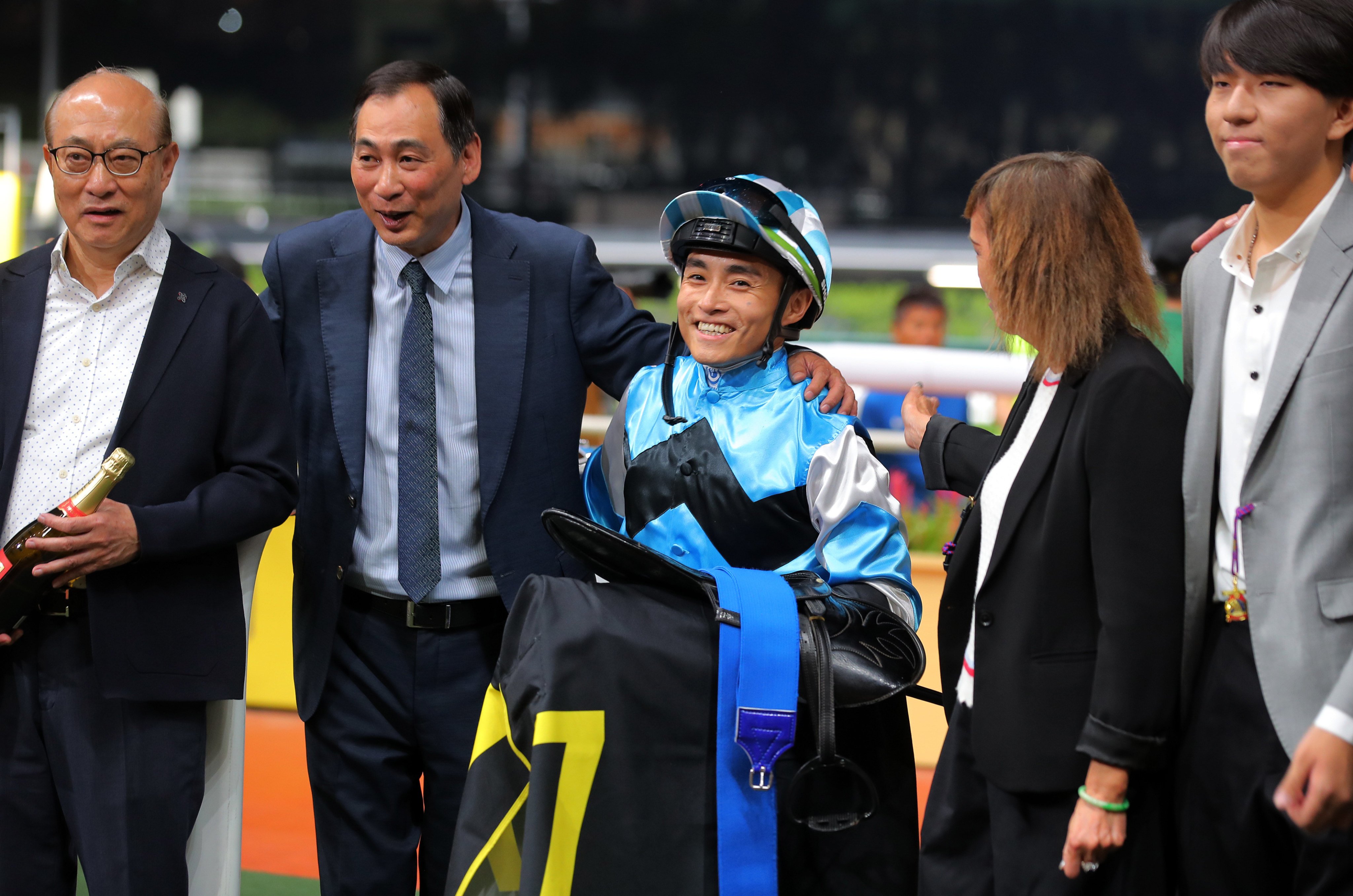 Trainer Michael Chang (second from left) and jockey Keith Yeung celebrate New Power’s win at Happy Valley. Photos: Kenneth Chan