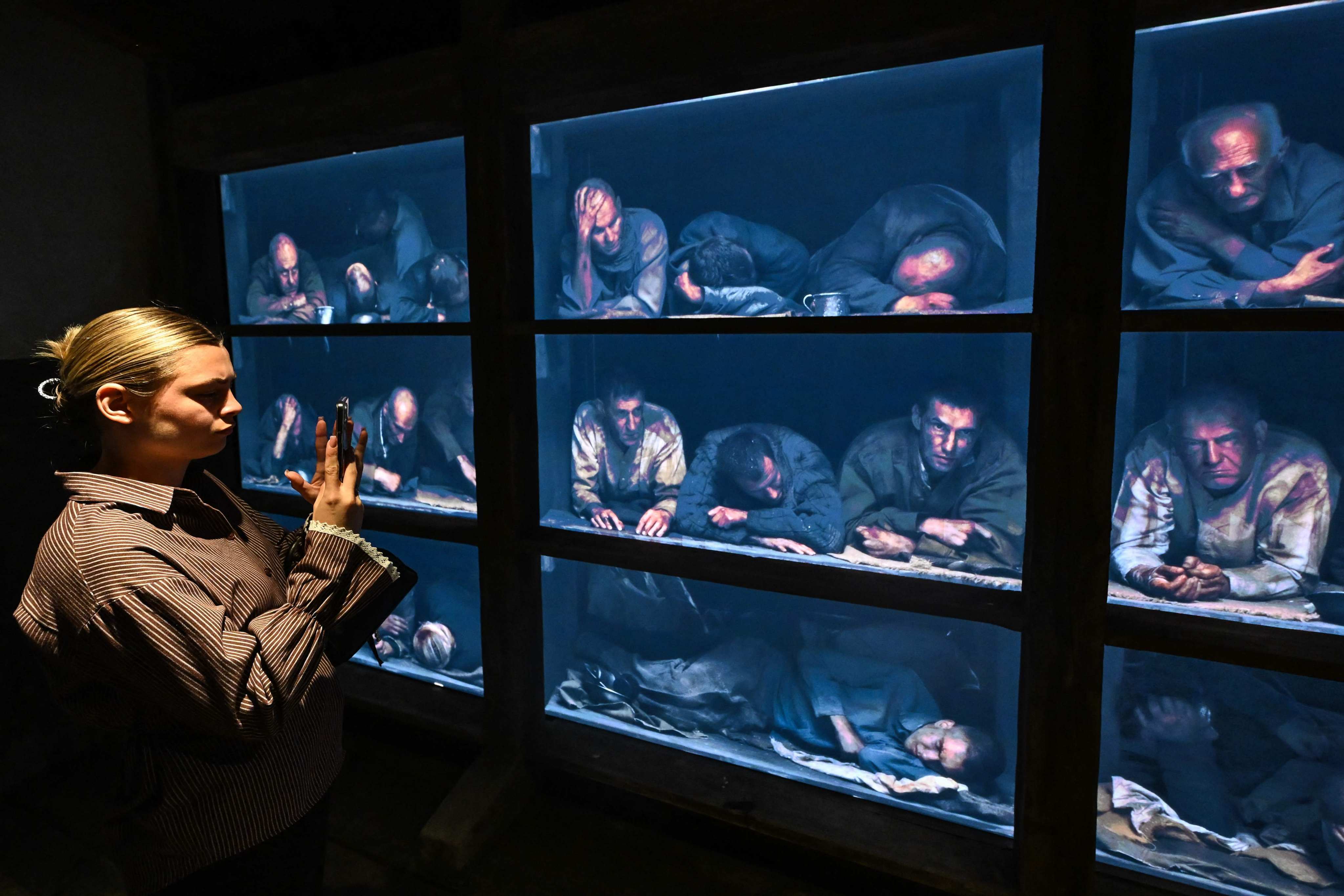 Visitors attend a guided tour at the Museum of Memory in Moscow on August 12. Photo: AFP