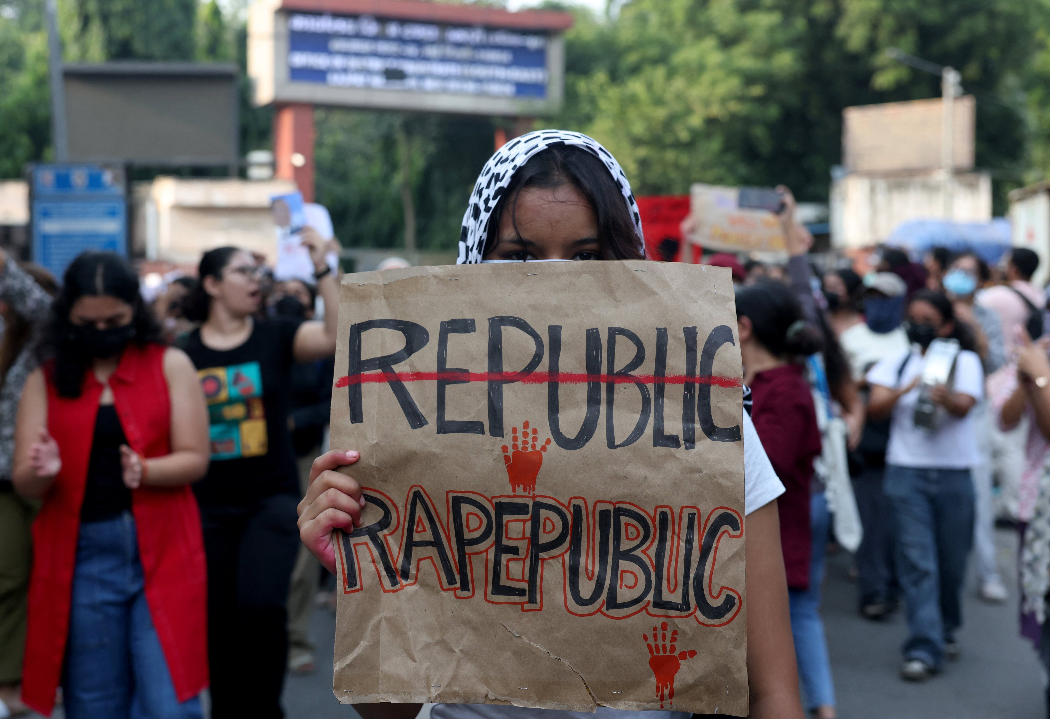 A college student holds a placard during a march last month demanding police action and better safety for women following the alleged gang rape of a girl in New Delhi. Photo: Reuters