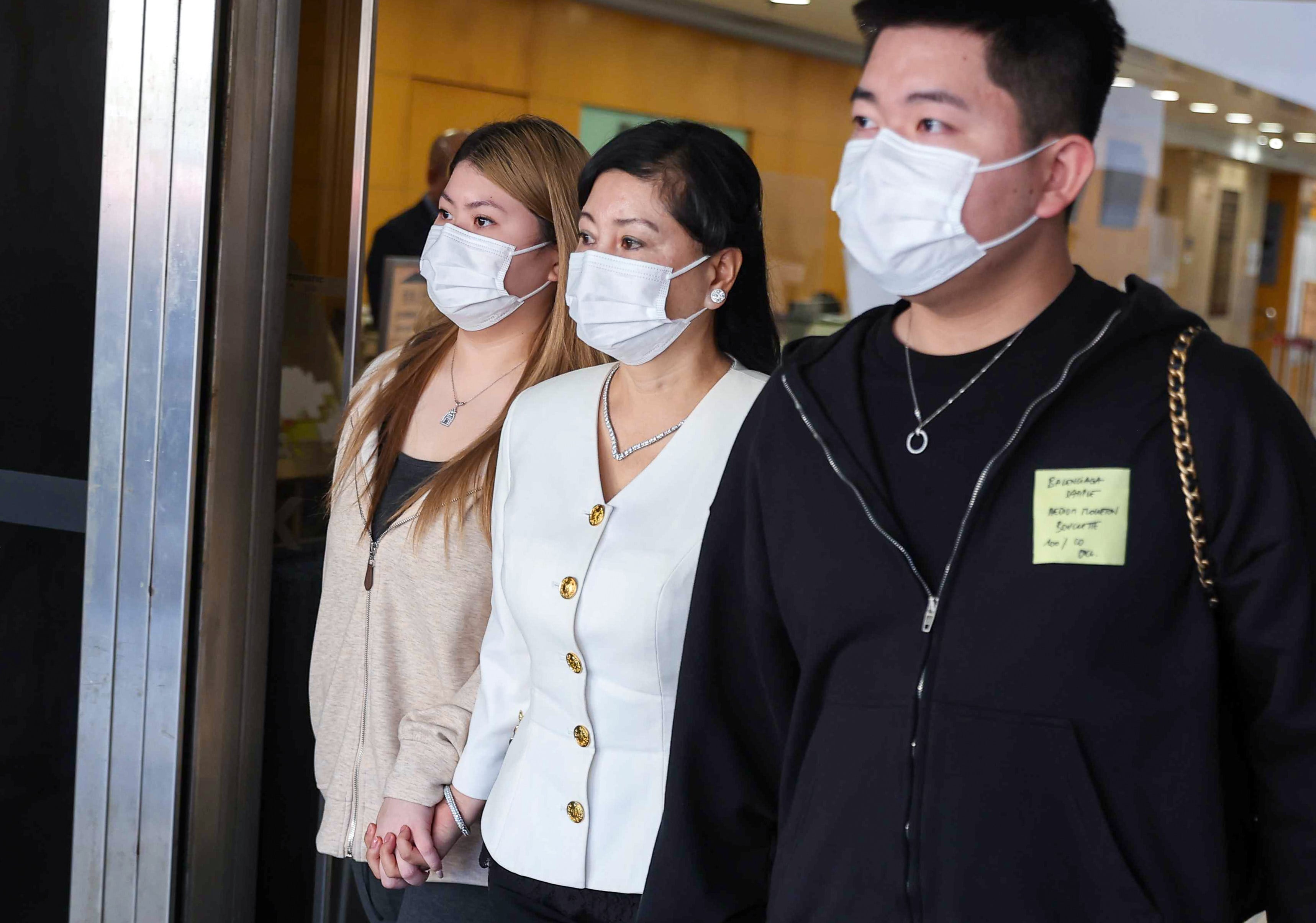 Abby Choi Tin-fung’s mother, Cheung Yin-Fa (centre), leaves the High Court on Wednesday. Photo: Edmond So