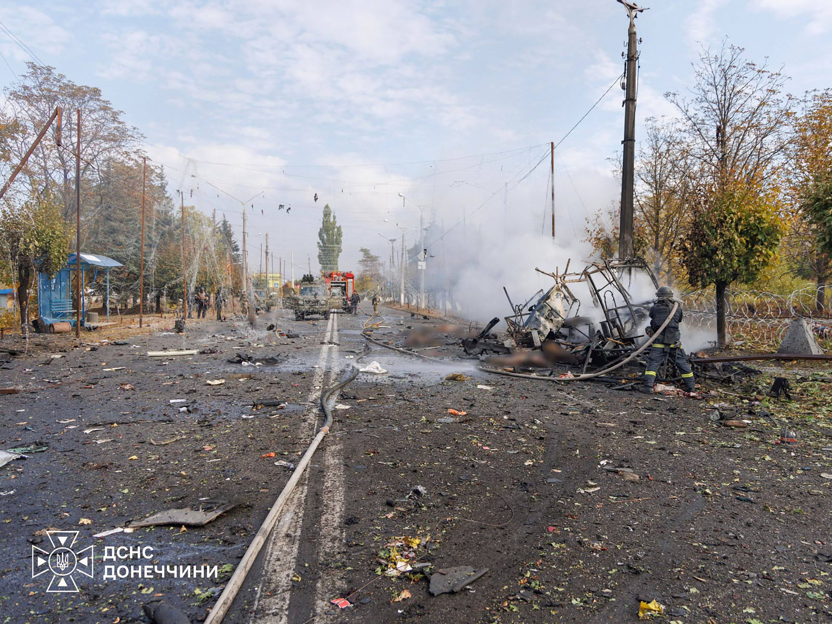 Firefighters working at the scene where two buses were struck by projectiles in Kramatorsk, near the frontline in eastern Ukraine, on Thursday. Photo: Ukrainian State Emergency Service / AFP