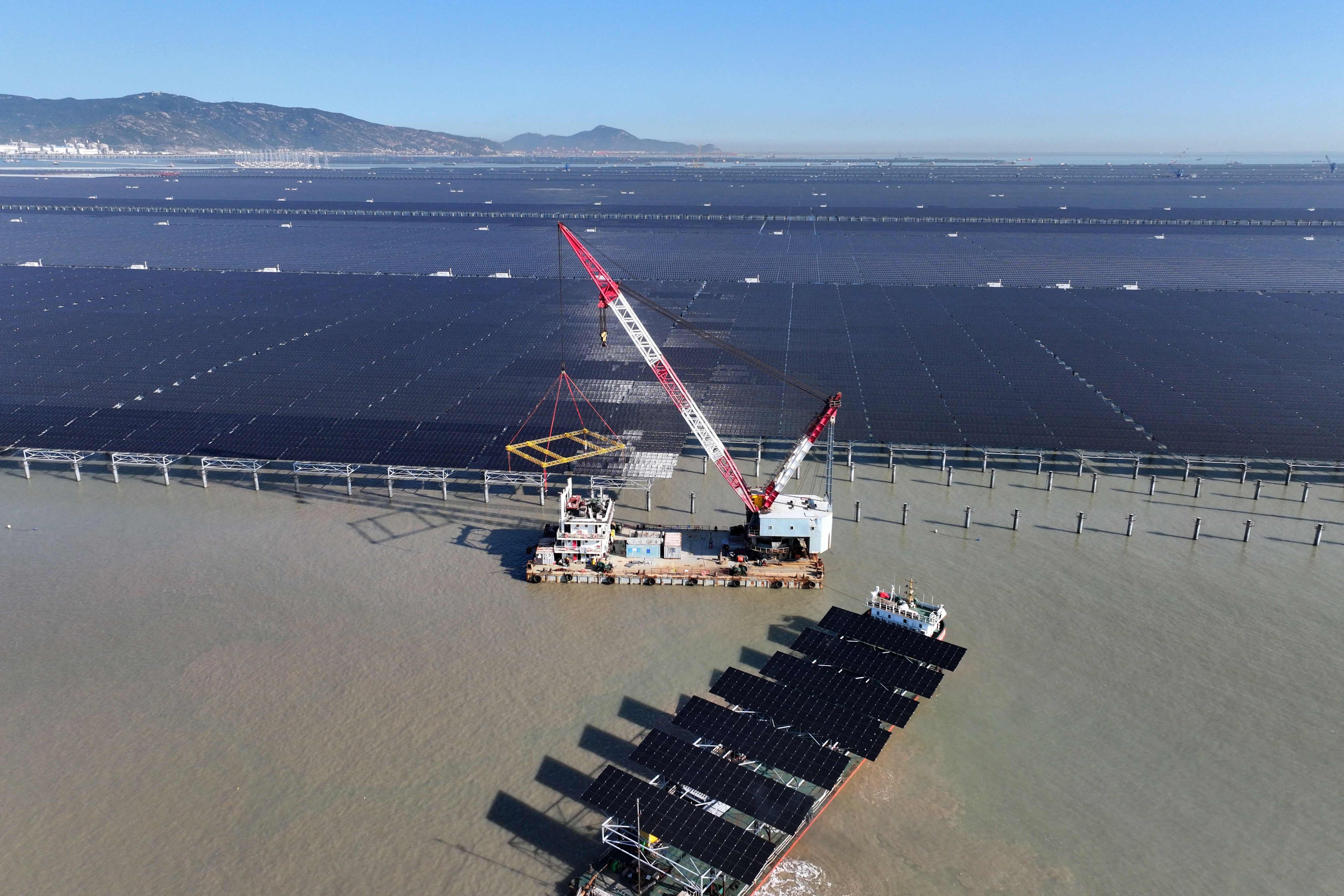 Construction of a tidal flat solar energy project is seen in Lianyungang, in eastern China’s Jiangsu province, on September 15, 2026. Photo: AFP