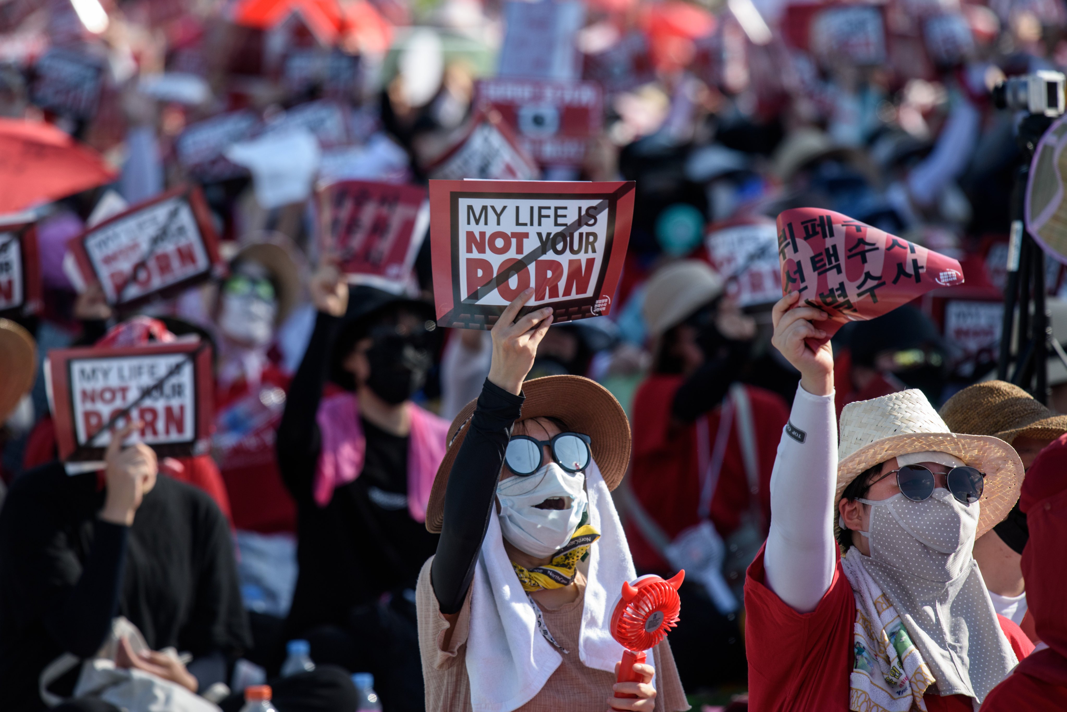 Women shout slogans during a rally against "spy-cam porn" in Seoul in 2018. Photo: AFP