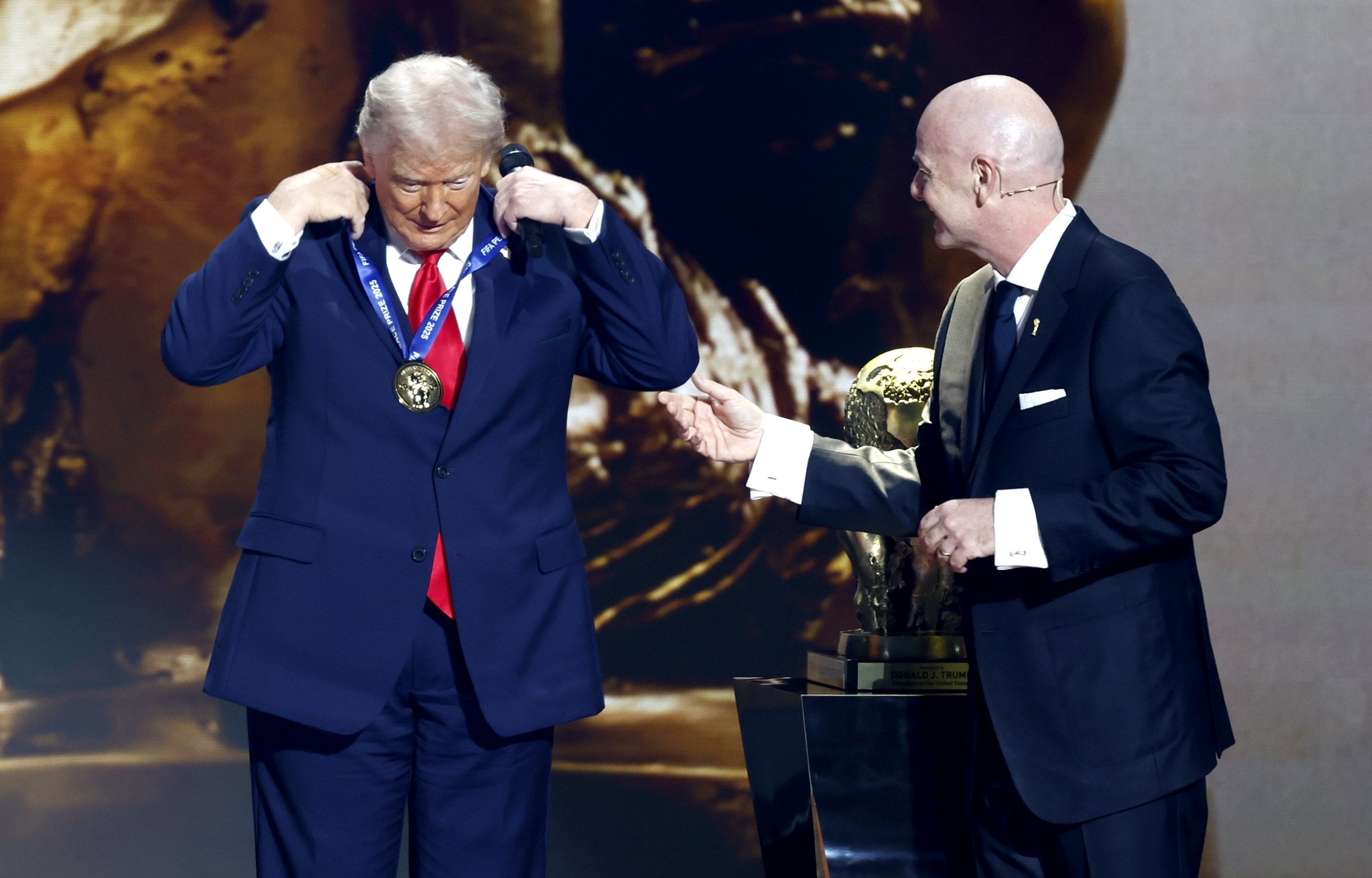 US President Donald Trump receives the Fifa Peace Prize from FIFA President Giovanni Infantino in Washington in December 2025. Photo: EPA