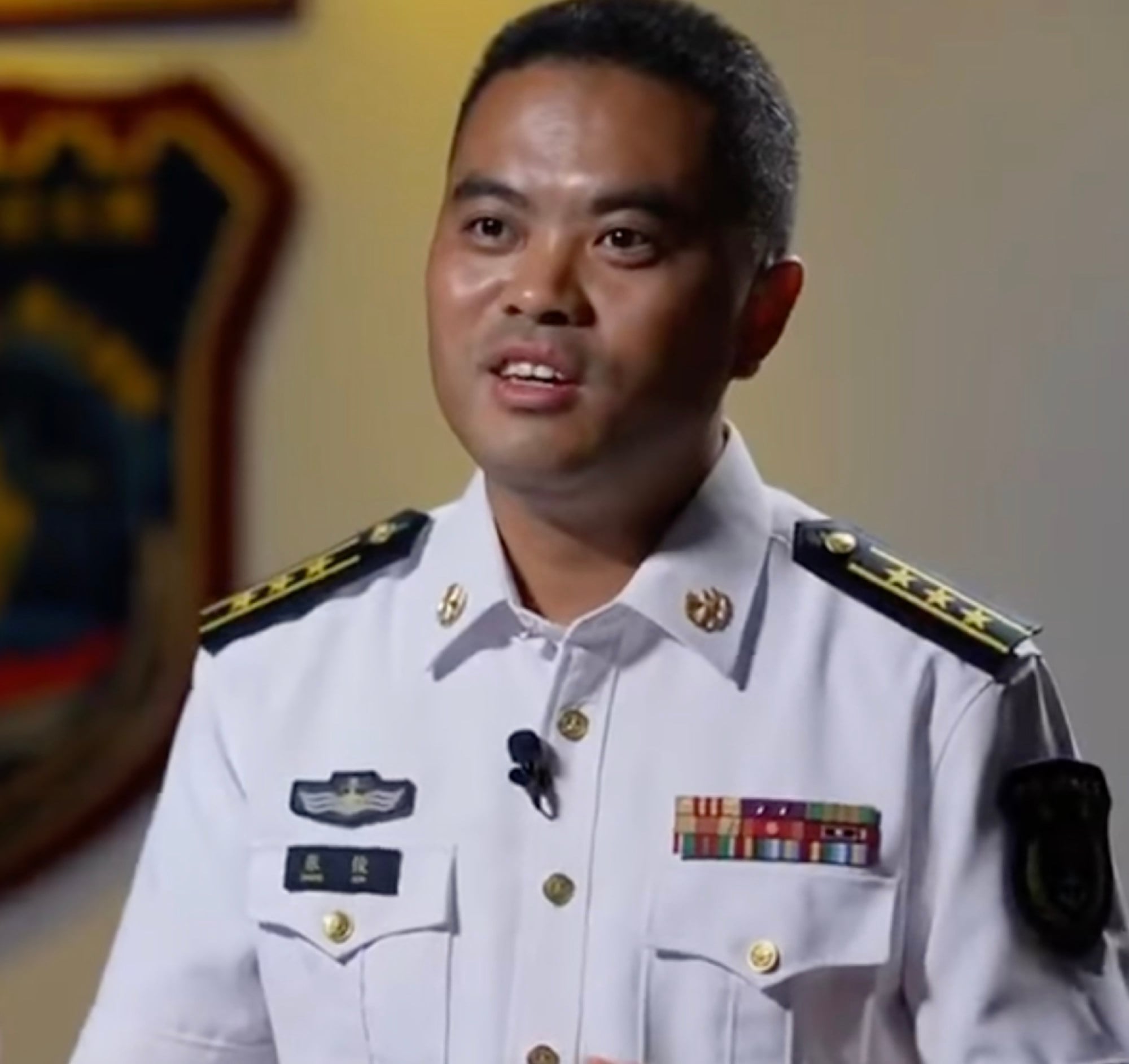 Zhang Jun, an officer aboard the destroyer Zunyi, gave Chinese state television an account of the incident. Photo: CCTV