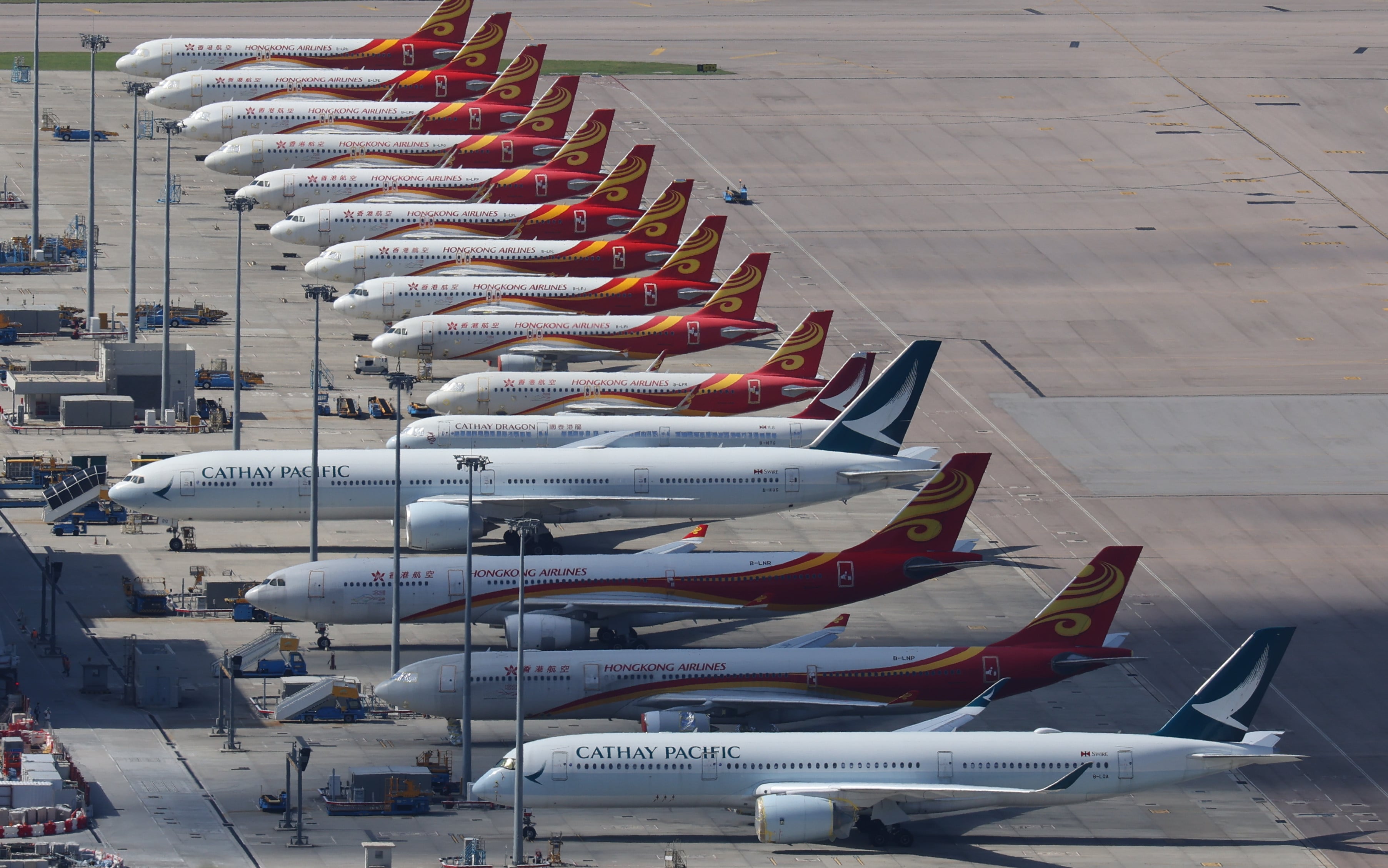 Aircraft at Hong Kong International Airport. Sustainable aviation fuel, a “drop-in” substitute, can be safely blended with jet fuel and used in aircraft engines without modification, but the challenge is the price. Photo: Dickson Lee