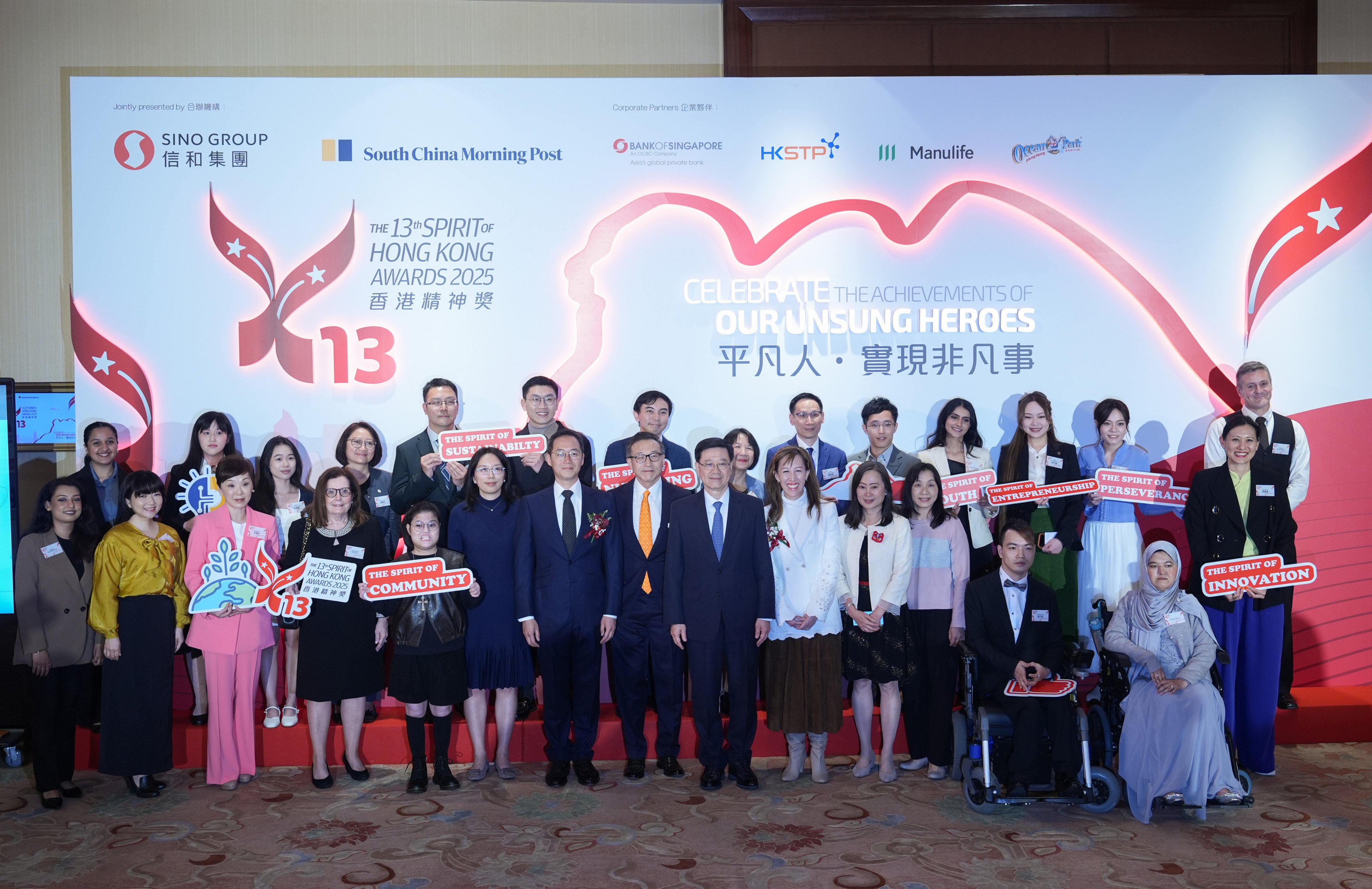 Chief Executive John Lee (centre), organisers and finalists at the last Spirit of Hong Kong Awards ceremony, held in February this year. Photo: Eugene Lee