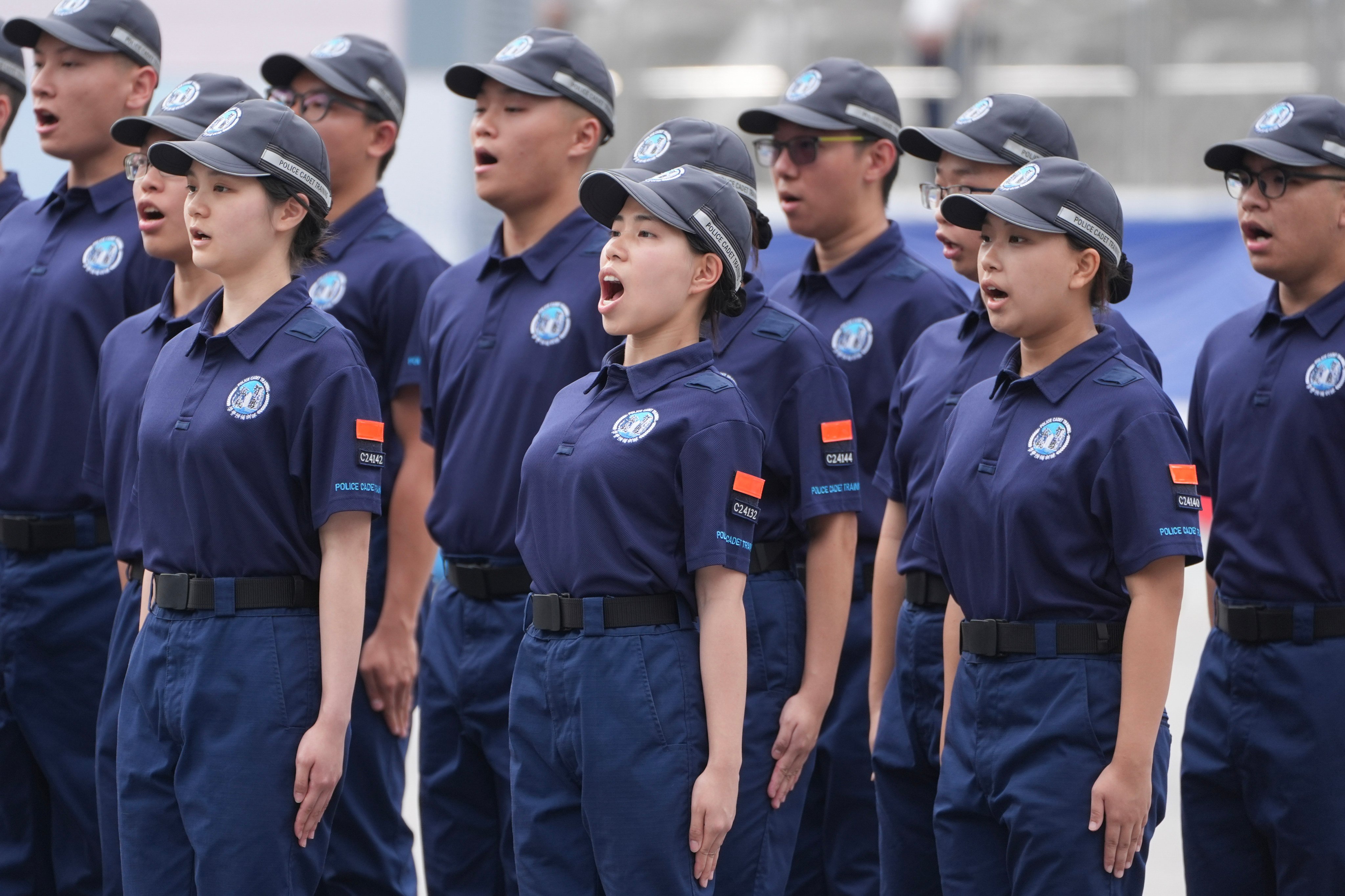 Graduates of the police cadet training programme take part in a parade at the Police College. Photo: Eugene Lee
