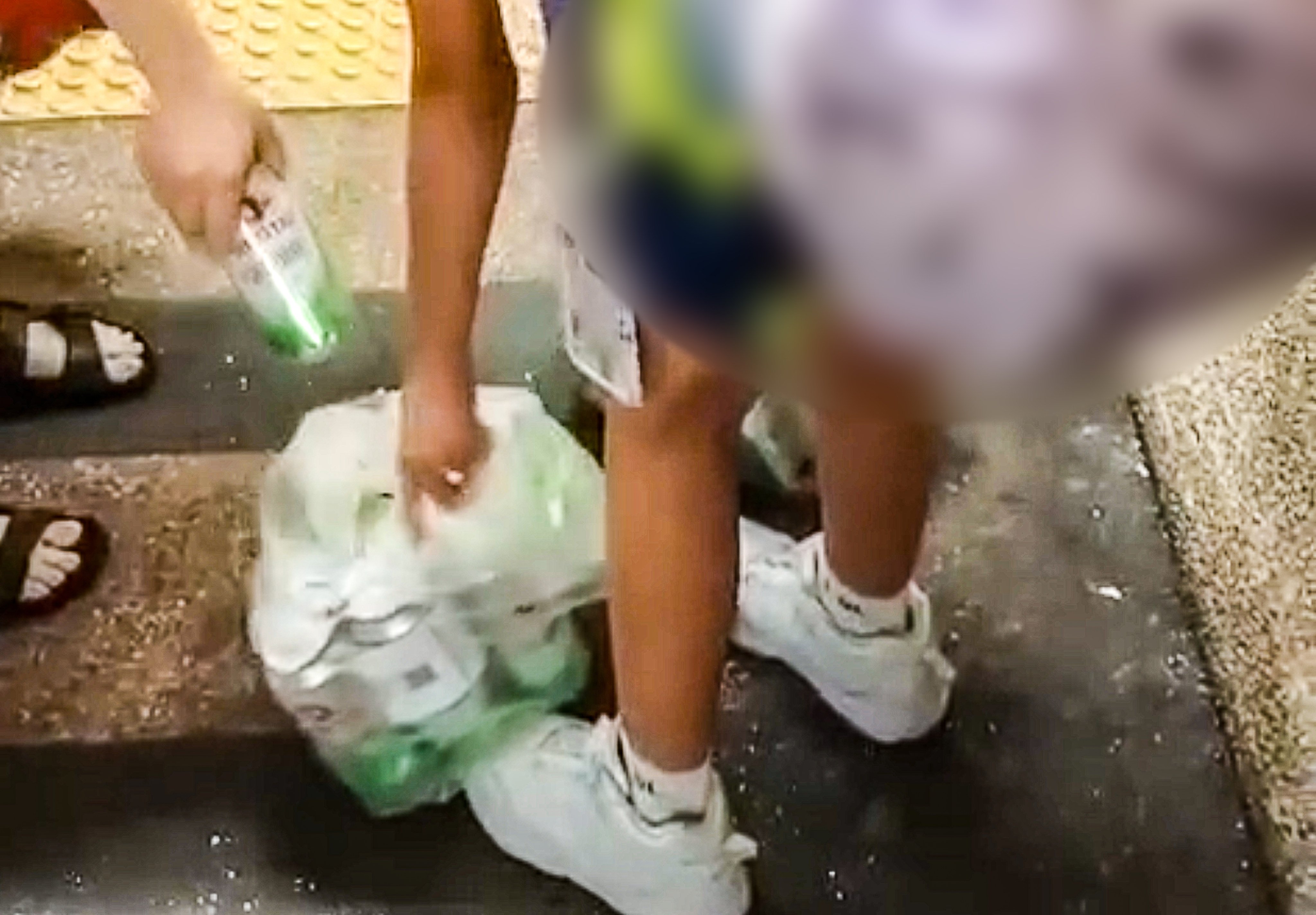 A viral video of a Hong Kong girl carrying heavy bags of beer has prompted welfare experts to warn about the lasting harm of psychological abuse. Photo: Handout
