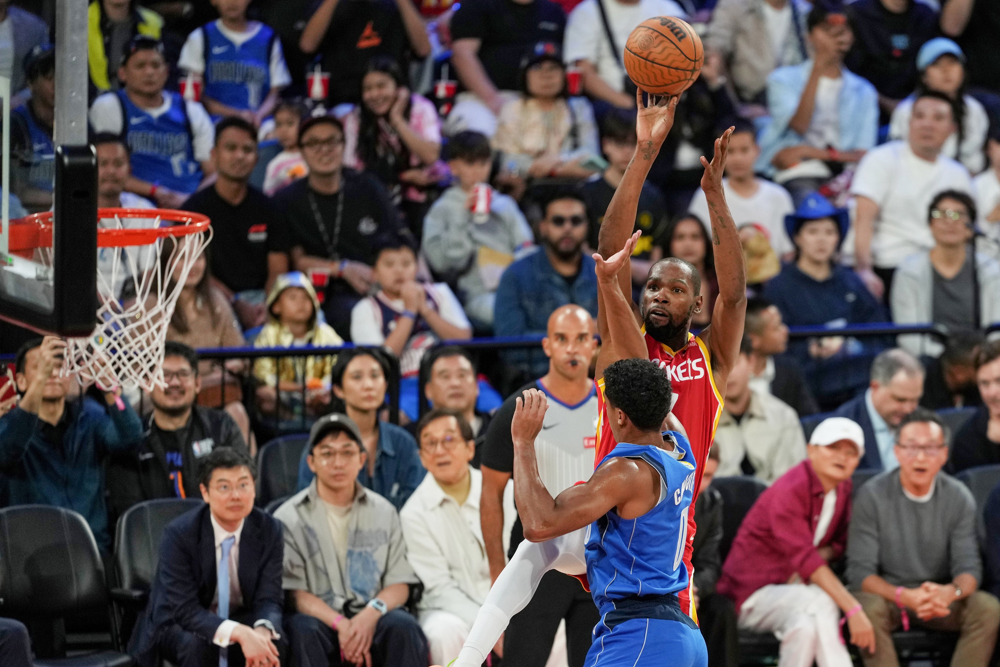 The Rockets’ Kevin Durant takes a shot against Dallas Mavericks in the first game of the NBA China Games in Macau on Friday. Photo: Elson Li
