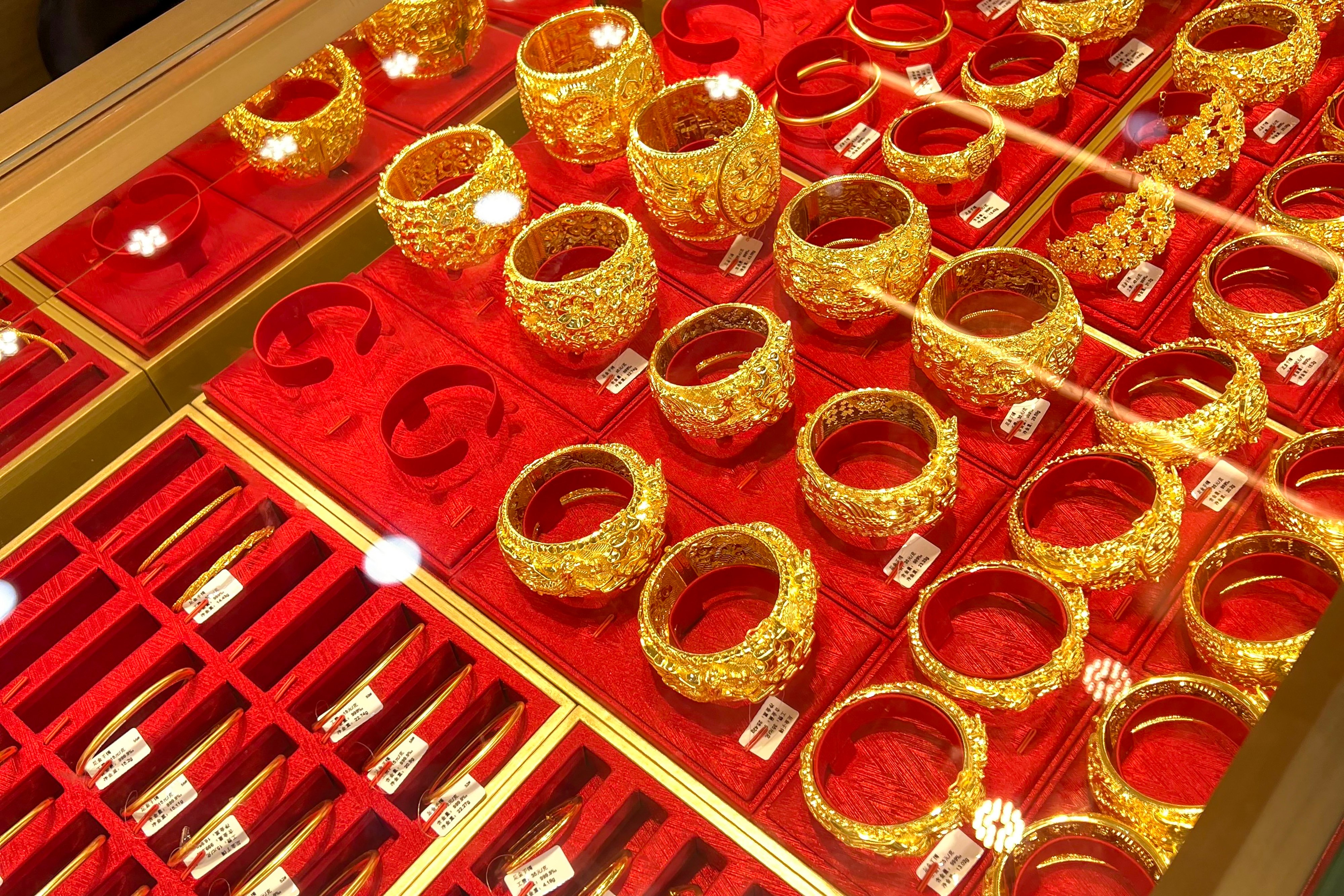 Gold wedding jewellery on display in Shenzhen’s Shuibei district. Photo: Mia Nurmamat