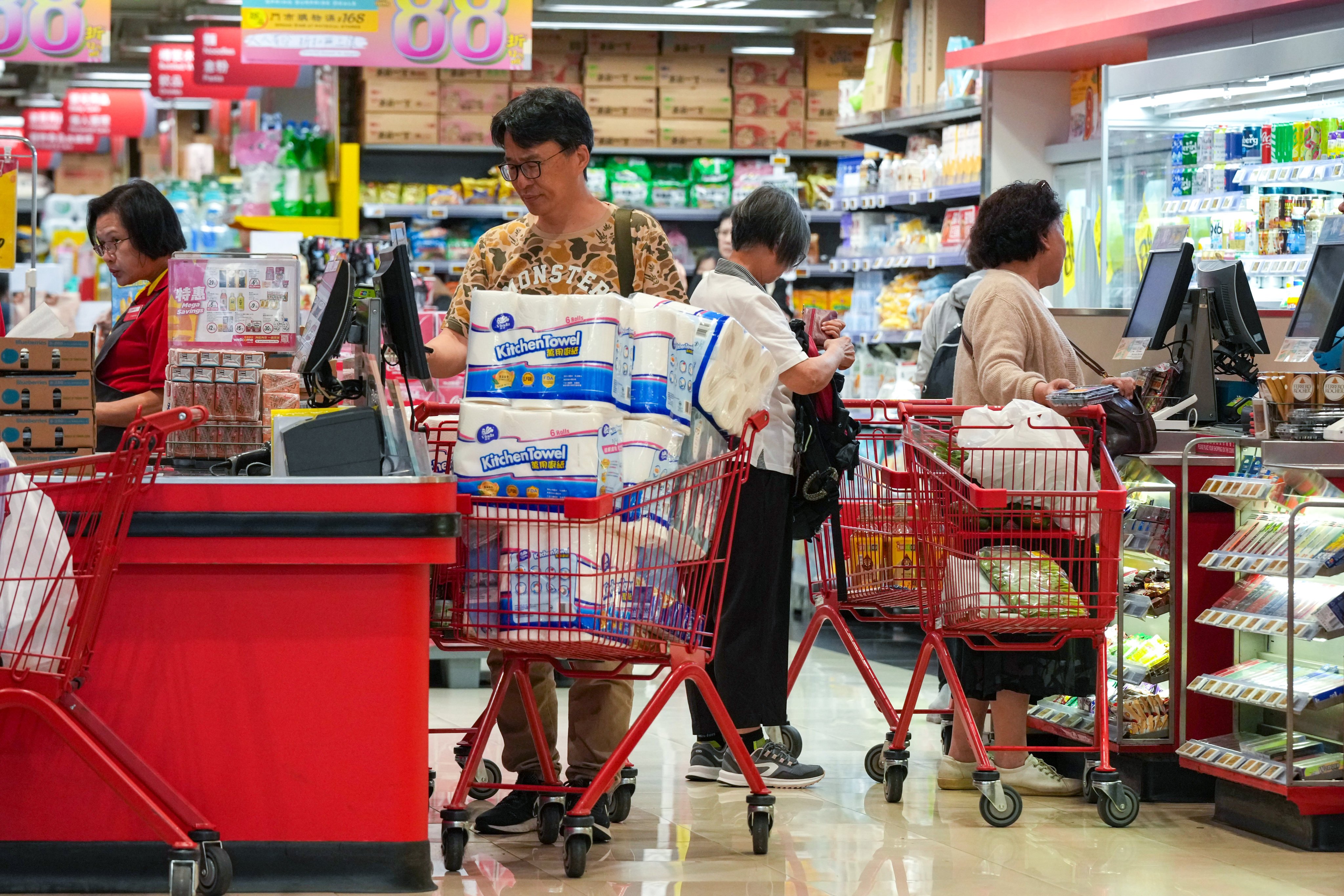 People shop at a Wellcome supermarket in Causeway Bay. Photo: Jelly Tse