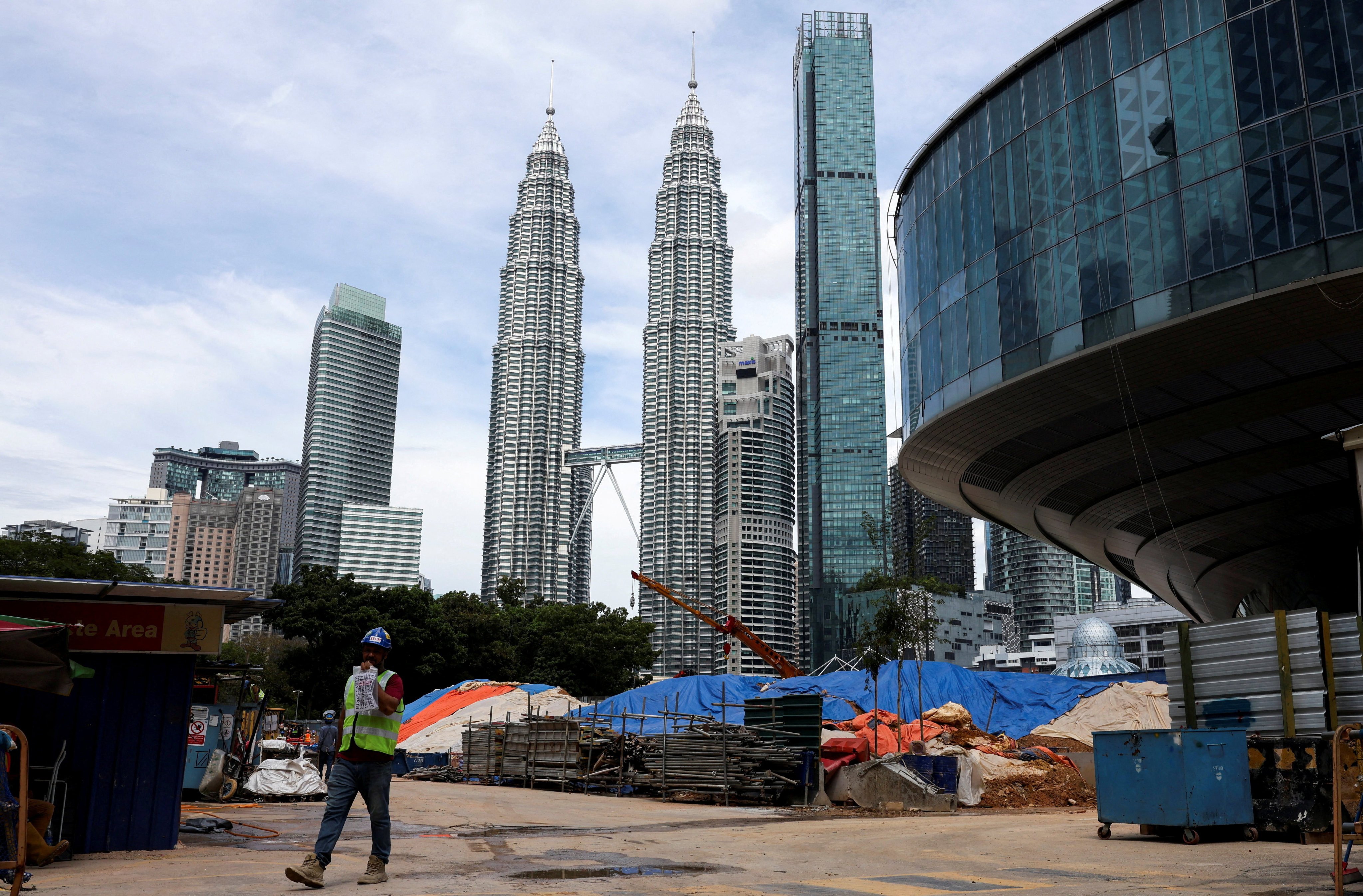 A construction site next to the Petronas Twin Towers in Kuala Lumpur. Photo: Reuters