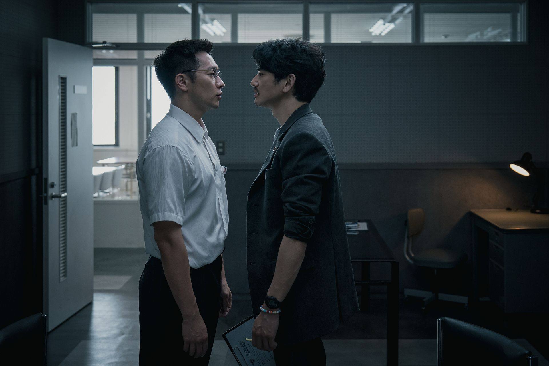 Son Suk-ku (left) and Eita Nagayama in a still from The Blue Road. Photo: Netflix.