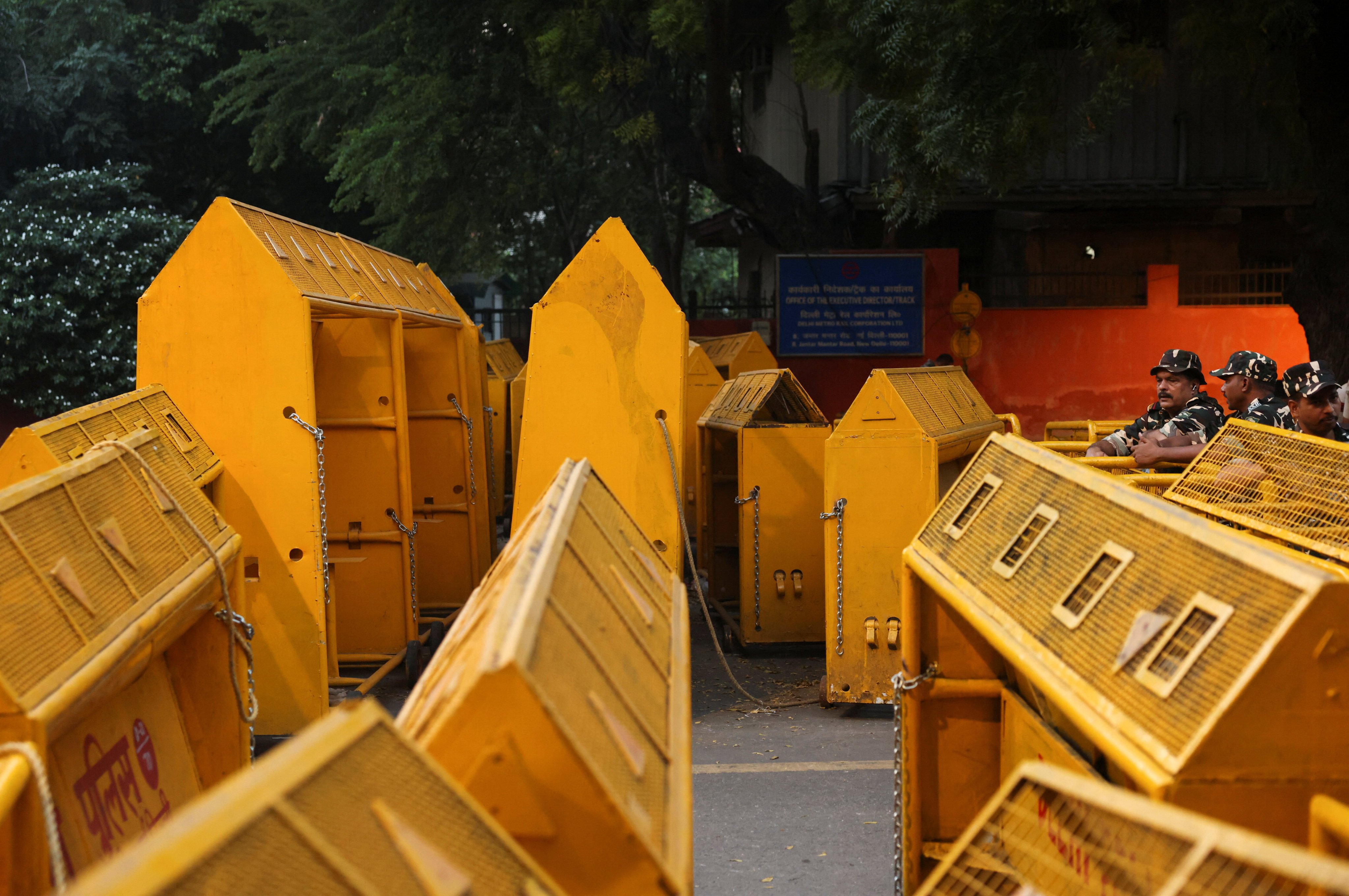 Security personnel stand by barricades ahead of a planned demonstration in New Delhi, India, on Friday. Photo: Reuters