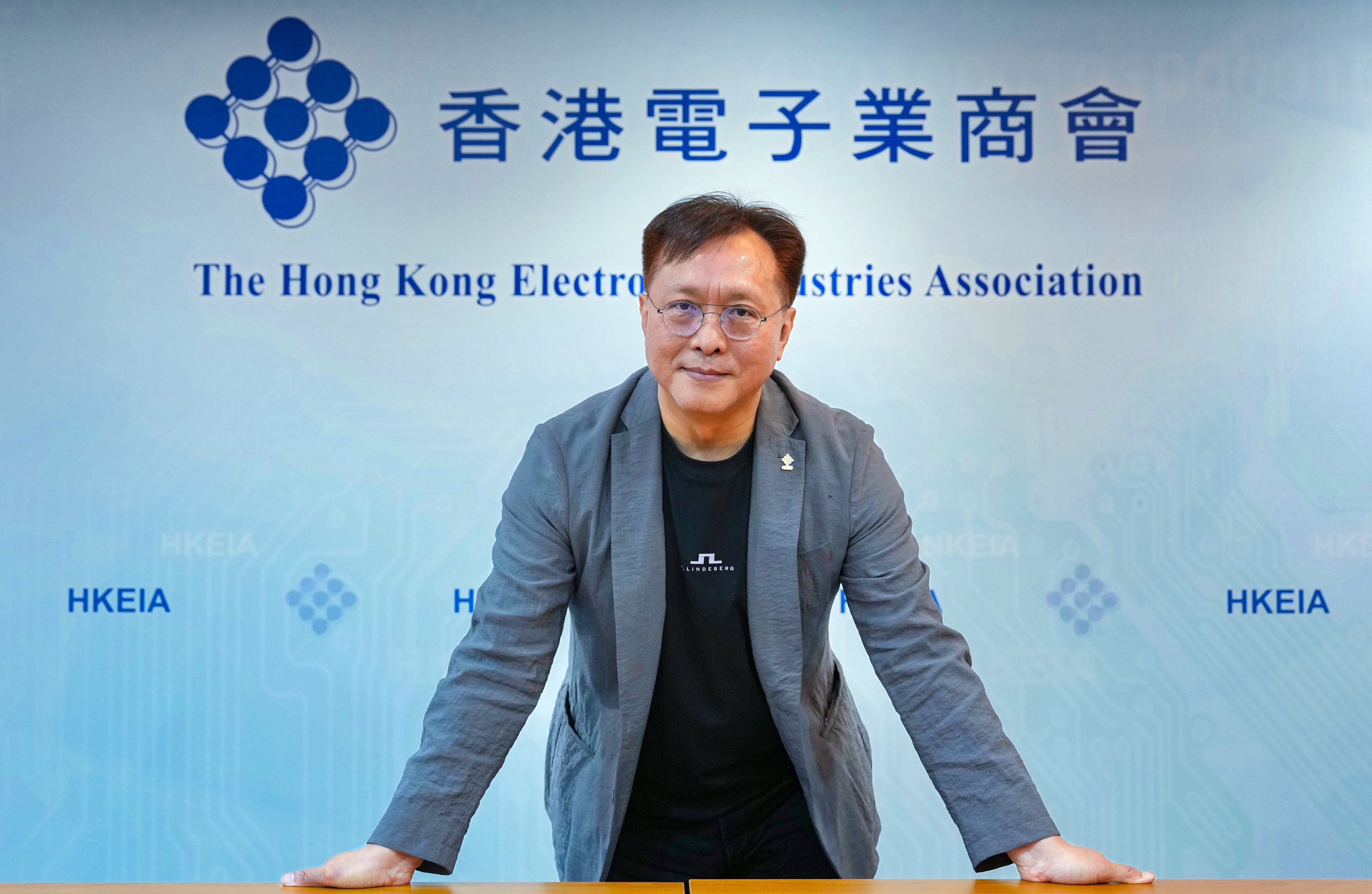 Samson Tam, honorary chairman of the Hong Kong Electronic Industries Association, poses for a photograph in Tsim Sha Tsui. Photo: Karma Lo