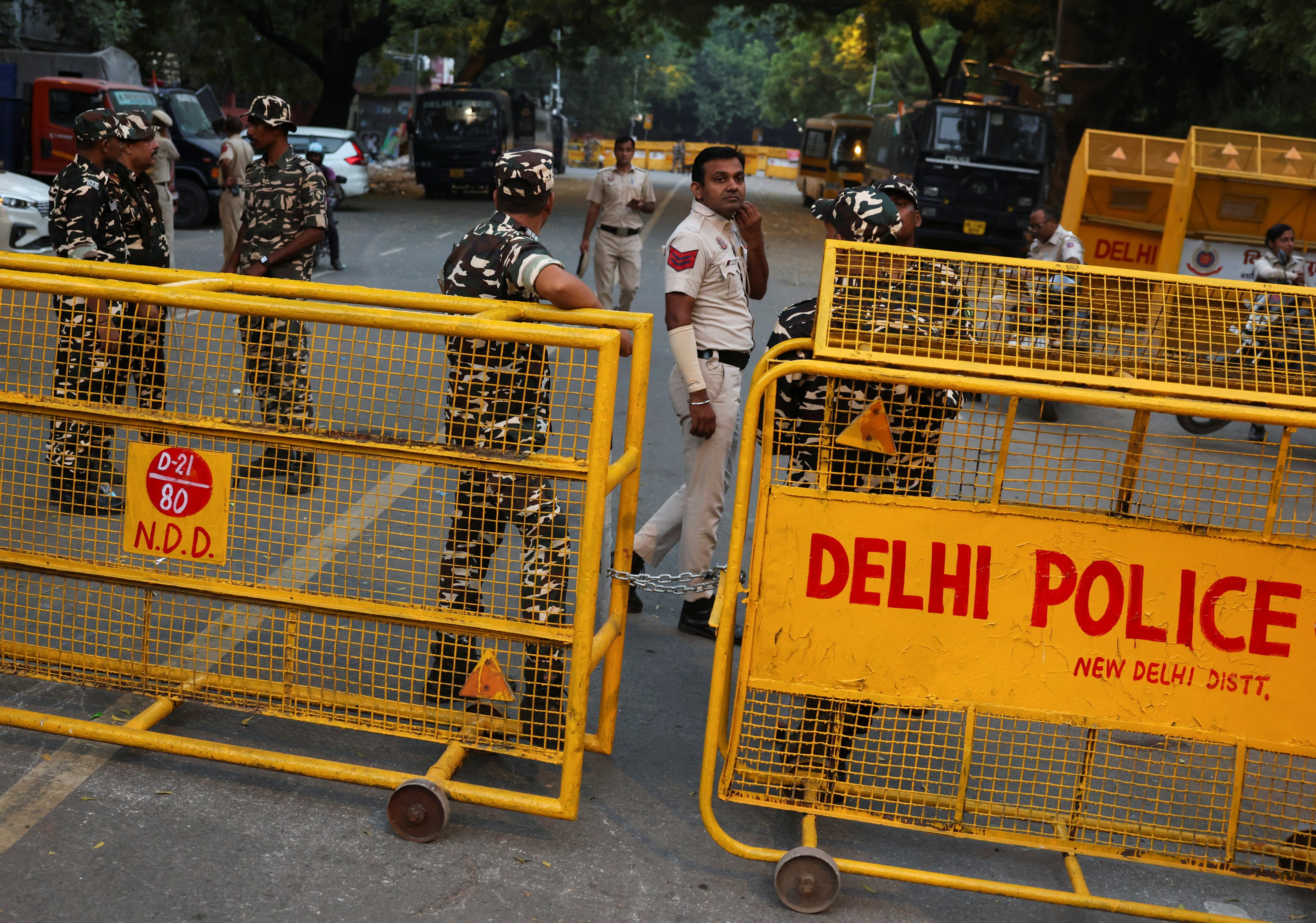 Security personnel stand by barricades ahead of a protest planned by the Cockroach Janta Party in New Delhi, India, on Friday. Photo: Reuters
