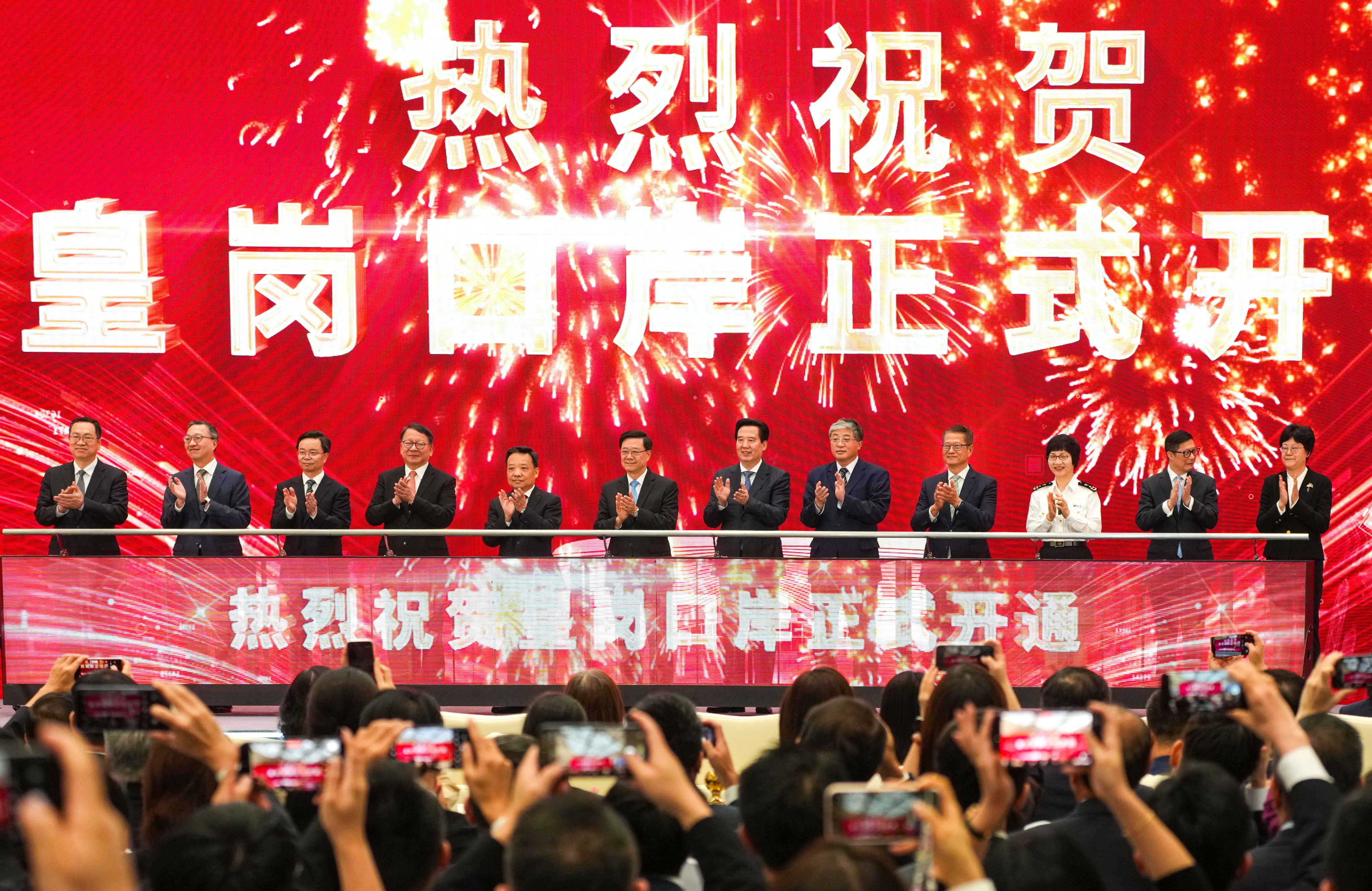 Chief Executive John Lee (sixth from left) and other officials at the opening ceremony of Huanggang Port in Shenzhen’s Futian district on Sunday. Photo: Kit Lai