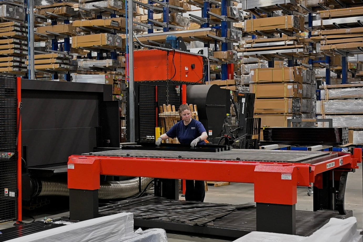 A worker handles aluminium components at a factory in North Jackson, Ohio. Photo: AFP