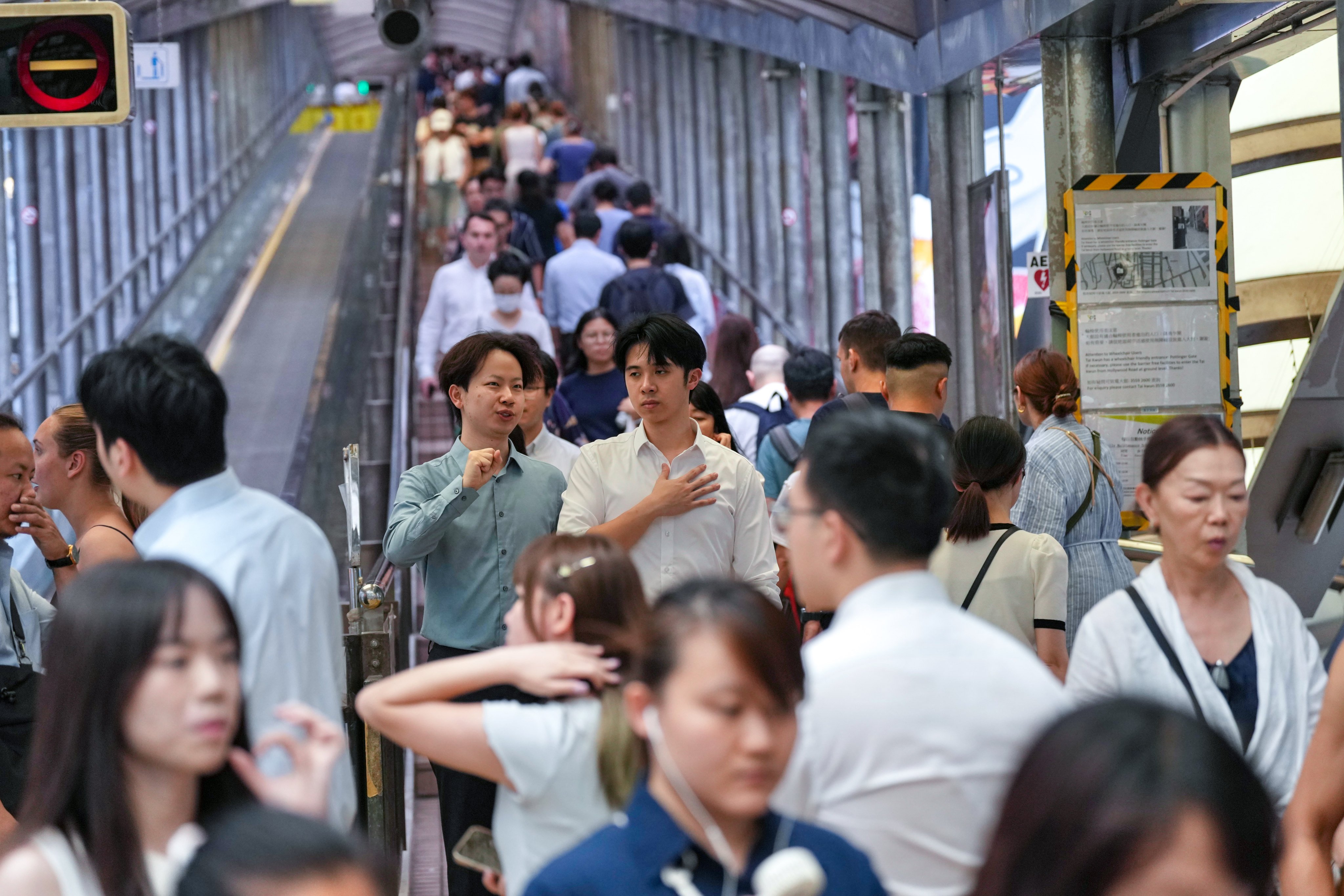 Workers and office staff in Hong Kong’s Central district during the lunchtime rush. Photo: Karma Lo