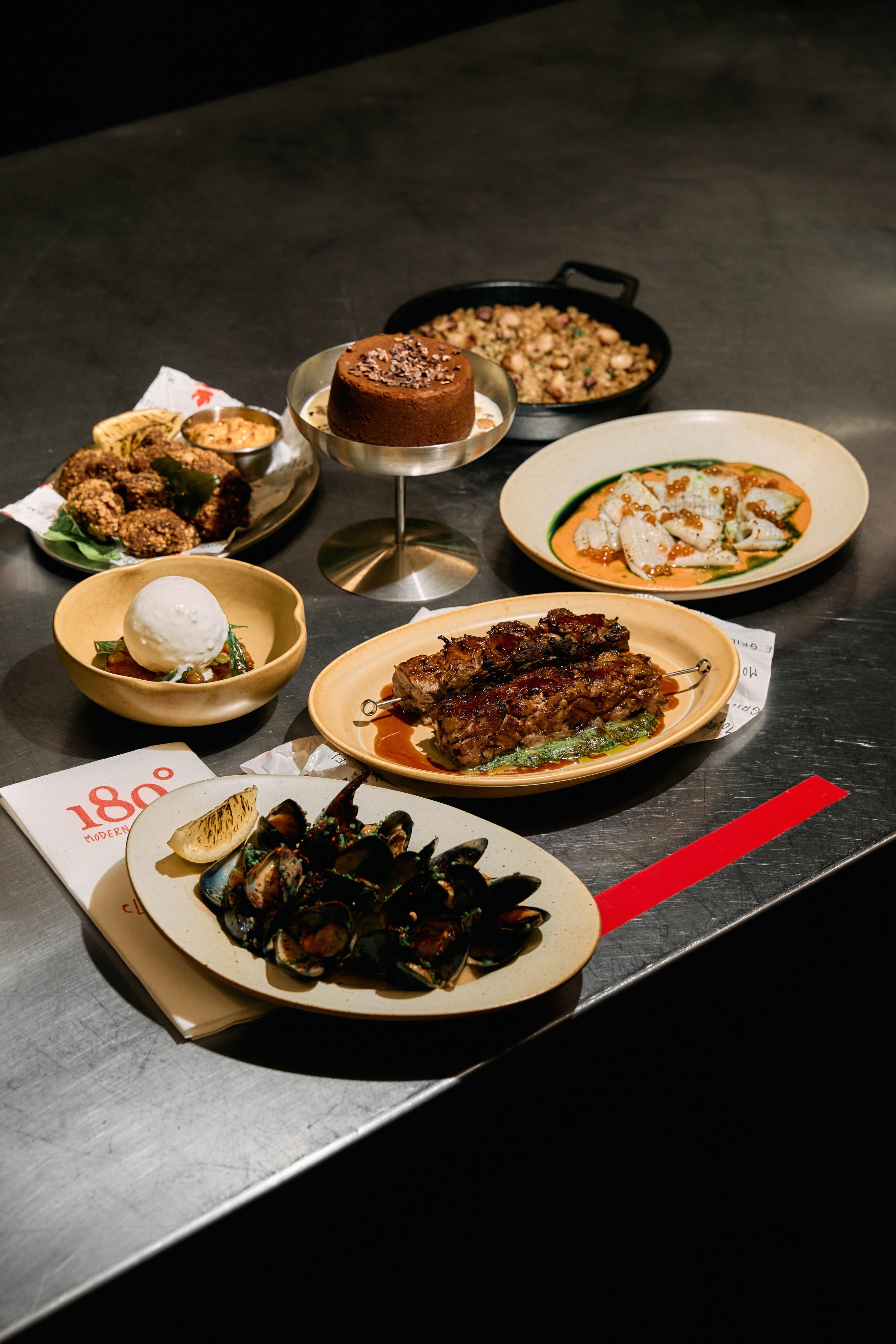 Dishes from 180º Modern Fire Grill, a restaurant centred on open-flame cooking. Photo: courtesy 180° Modern Fire Grill