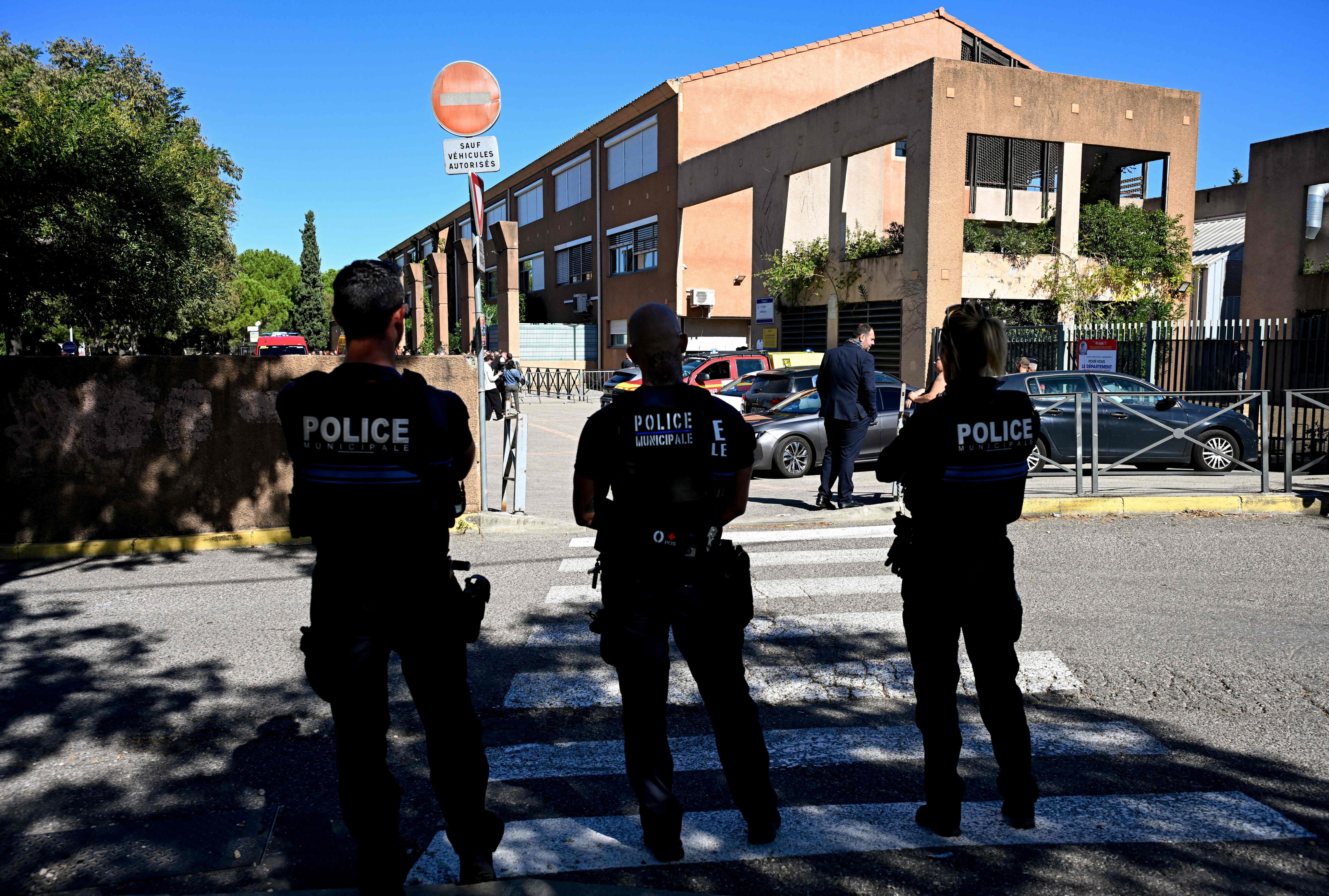 French police officers patrol outside the Joseph-Lakanal middle school in Aubagne, southern France, on Monday after a shooting. Photo: AFP
