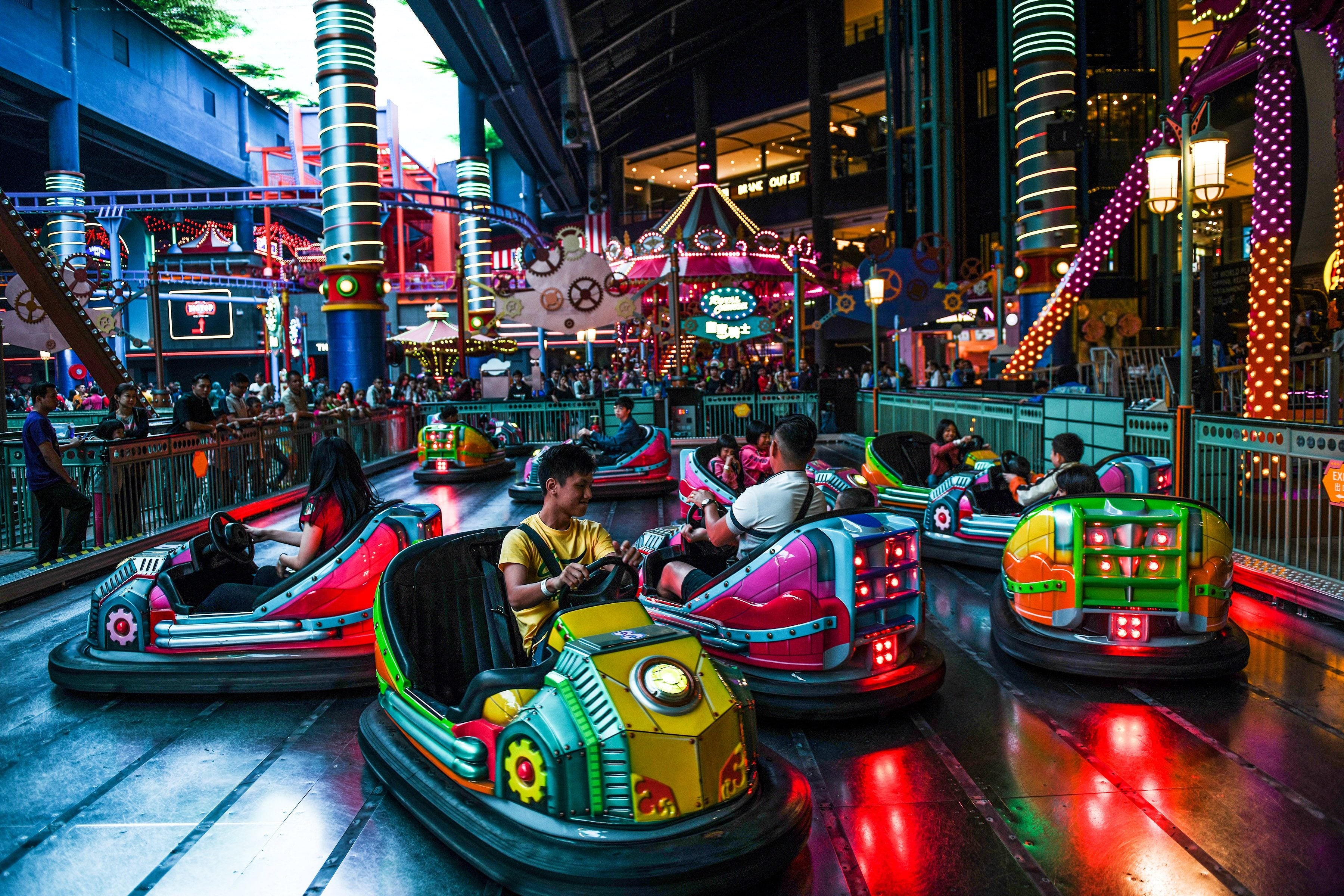 People ride dodgems at an indoor amusement park in Genting Highlands resort, Malaysia, in 2019. Photo: AFP