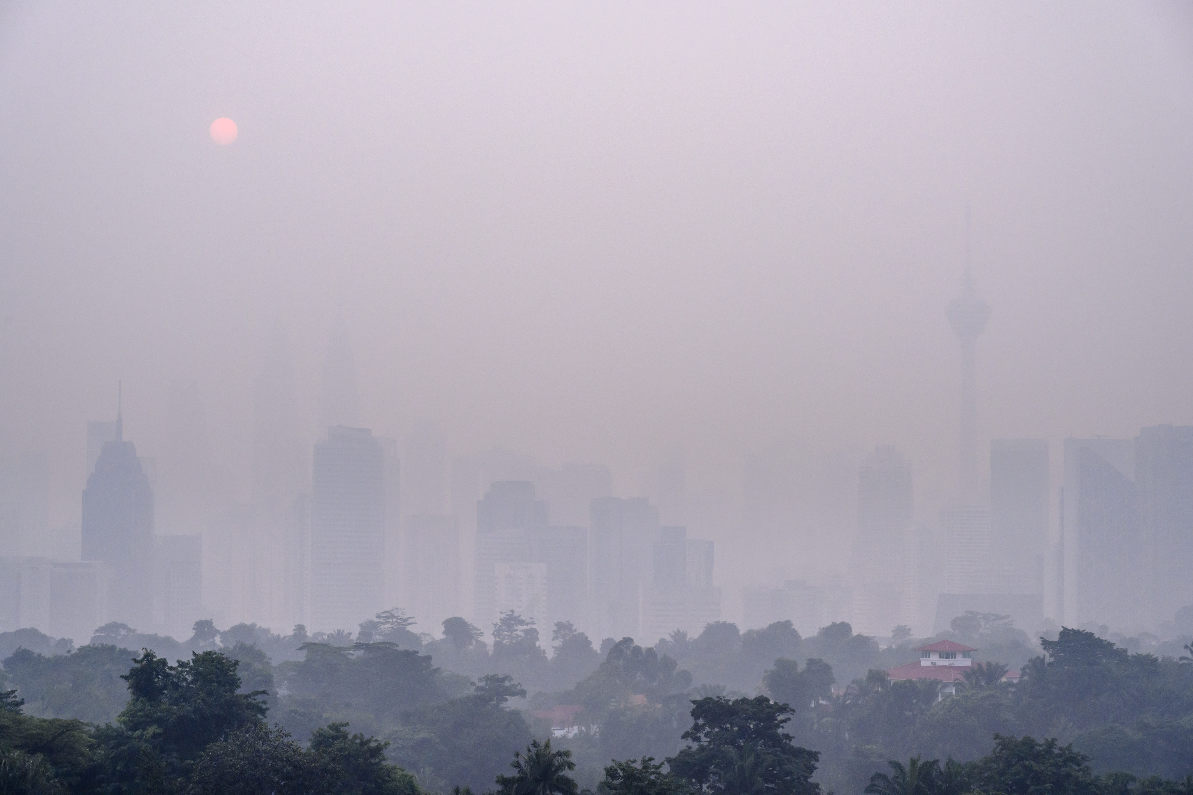 Smog-shrouded buildings in Kuala Lumpur, Malaysia, on Friday. Photo: Xinhua
