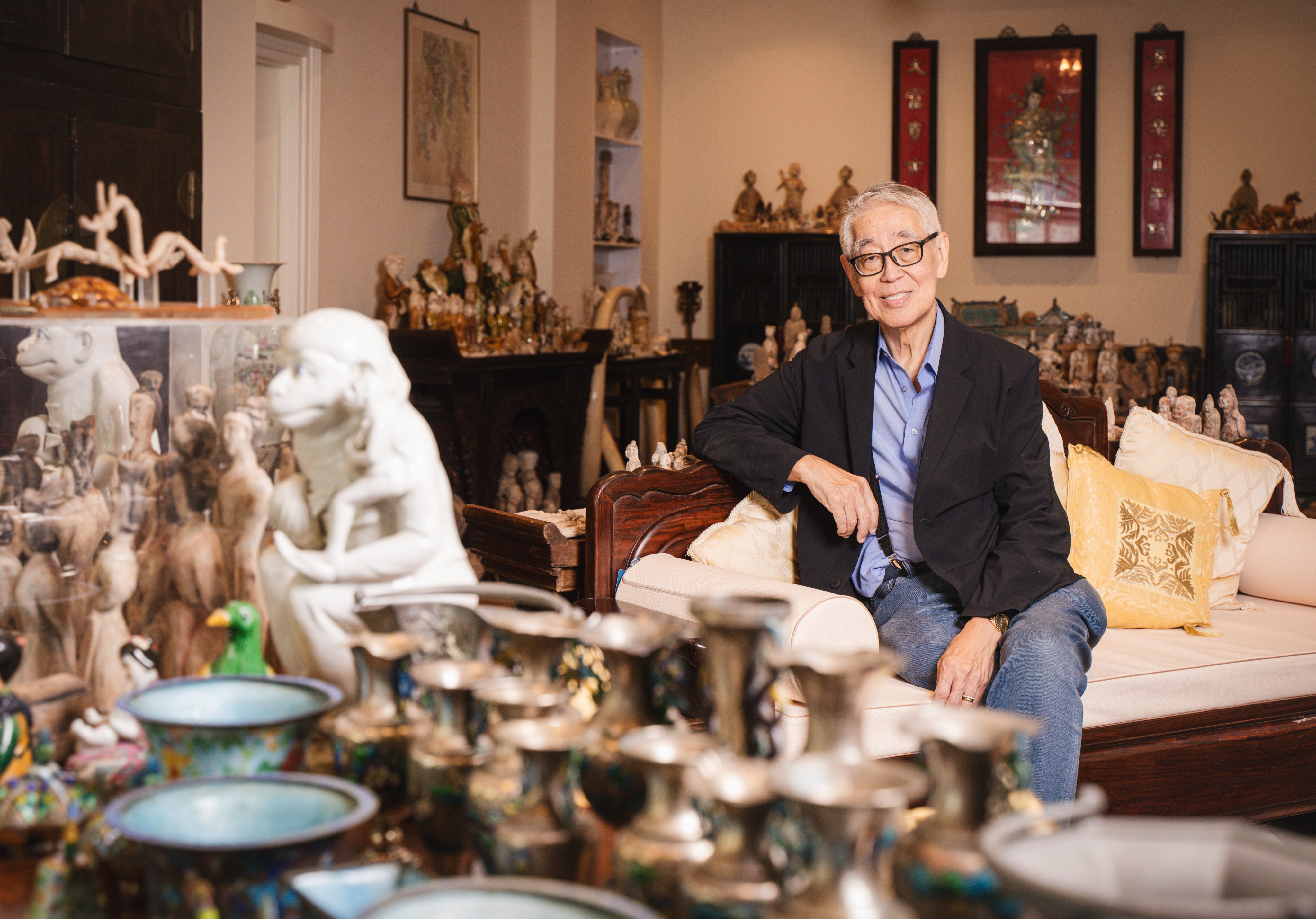 Robert Chua at home in Kowloon with some of his artefacts. Alexander Mak