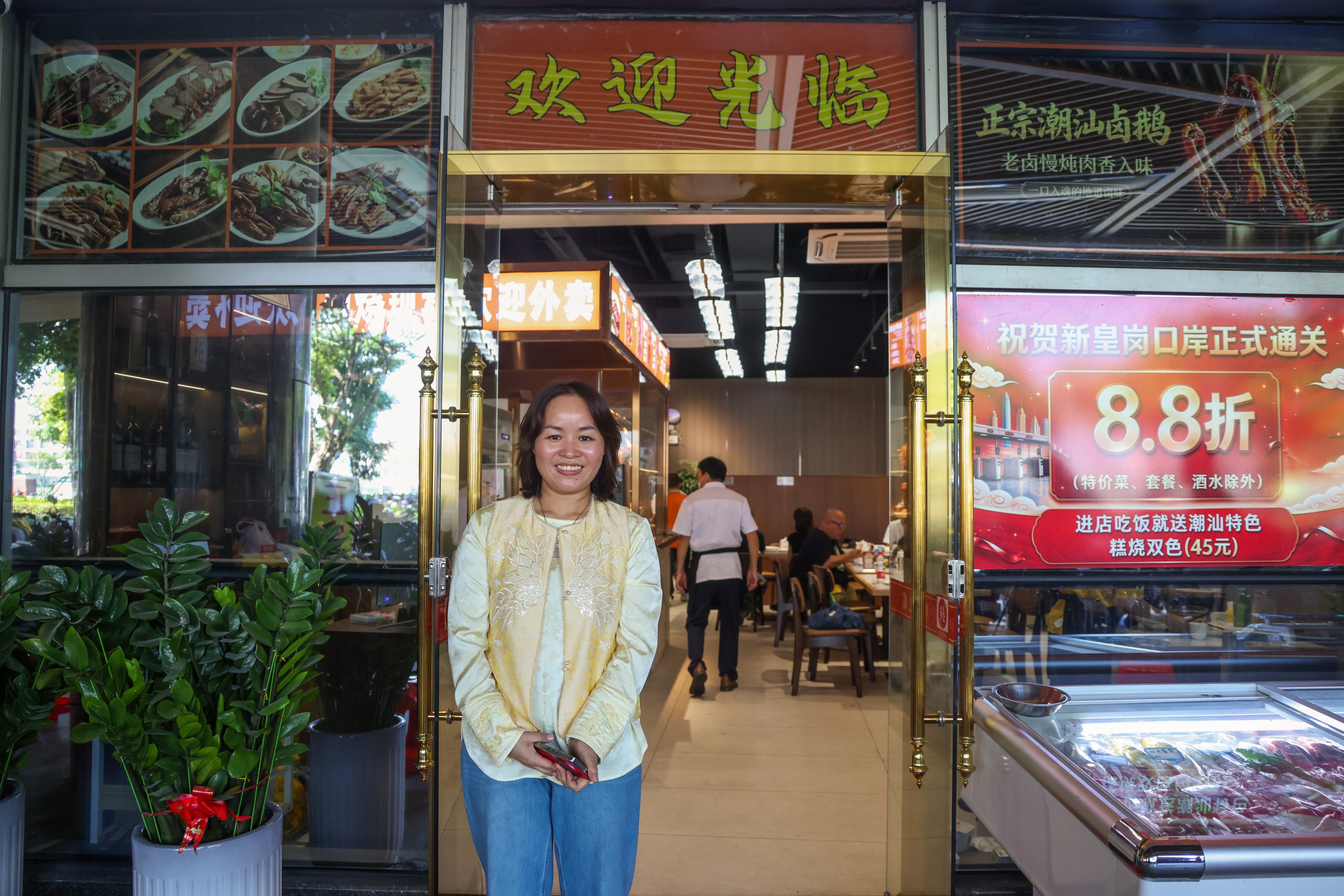 Nana Xue, owner of Tiger Teochew, at the commercial arcade opposite the new Huanggang Port in Shenzhen. Photo: Silvia Siu