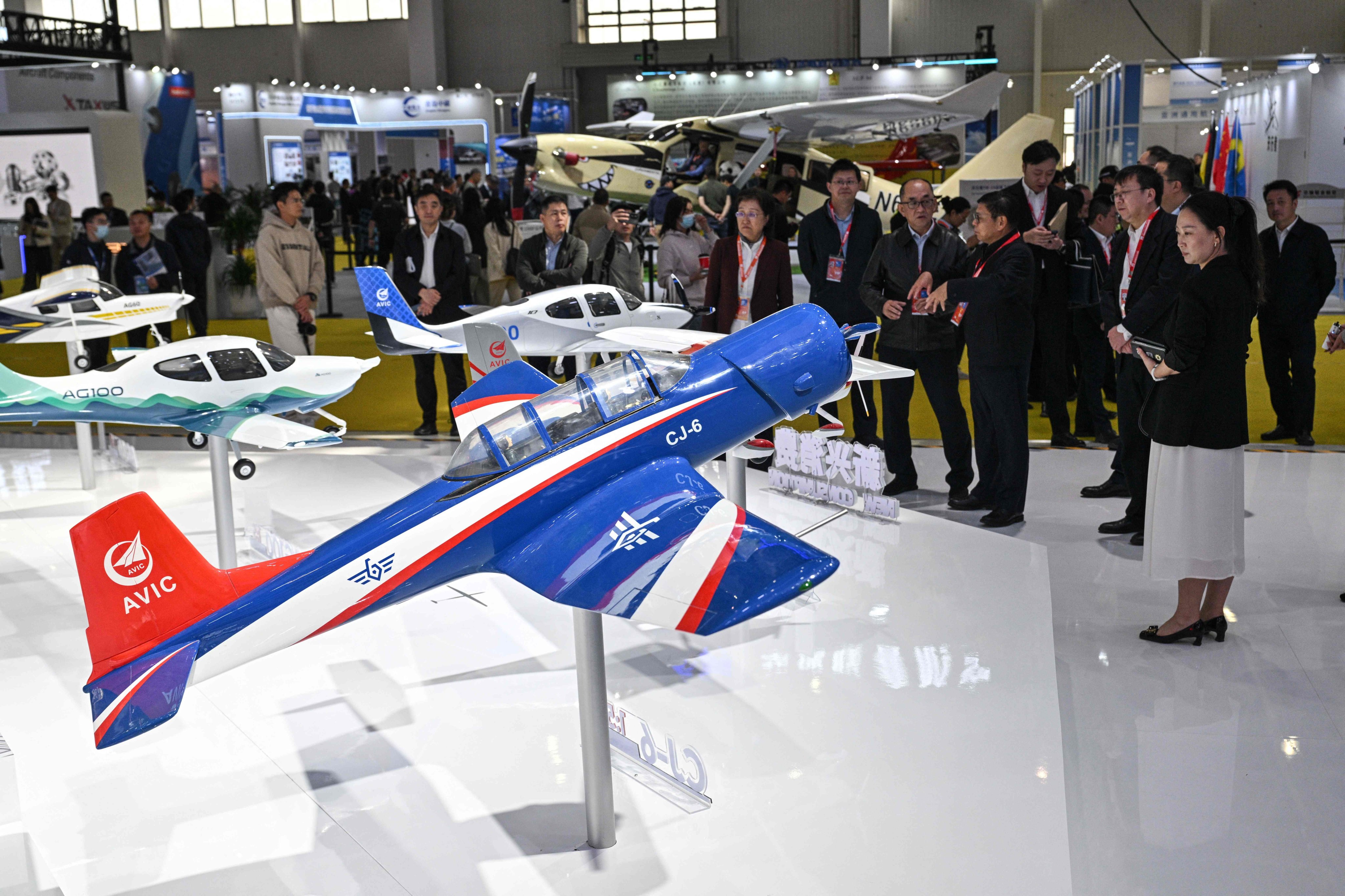 People visit the booth of the Aviation Industry Corporation of China (AVIC) during the Aero Asia show in Zhuhai, in southern China’s Guangdong province on November 27, 2025. Photo: AFP