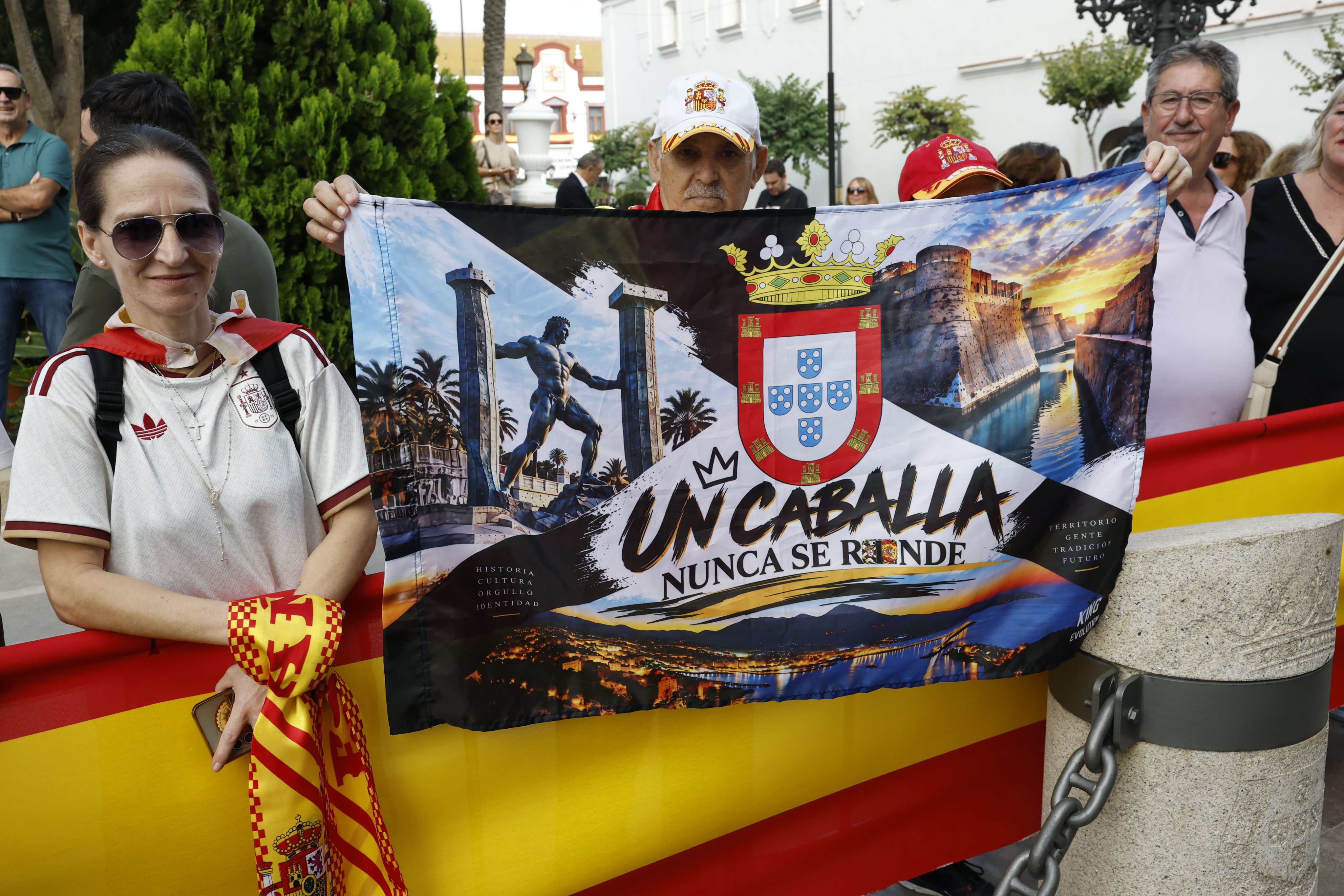 Crowds wave Spanish flags outside the Ceuta City Hall ahead of a royal visit on Tuesday. Photo: EPA