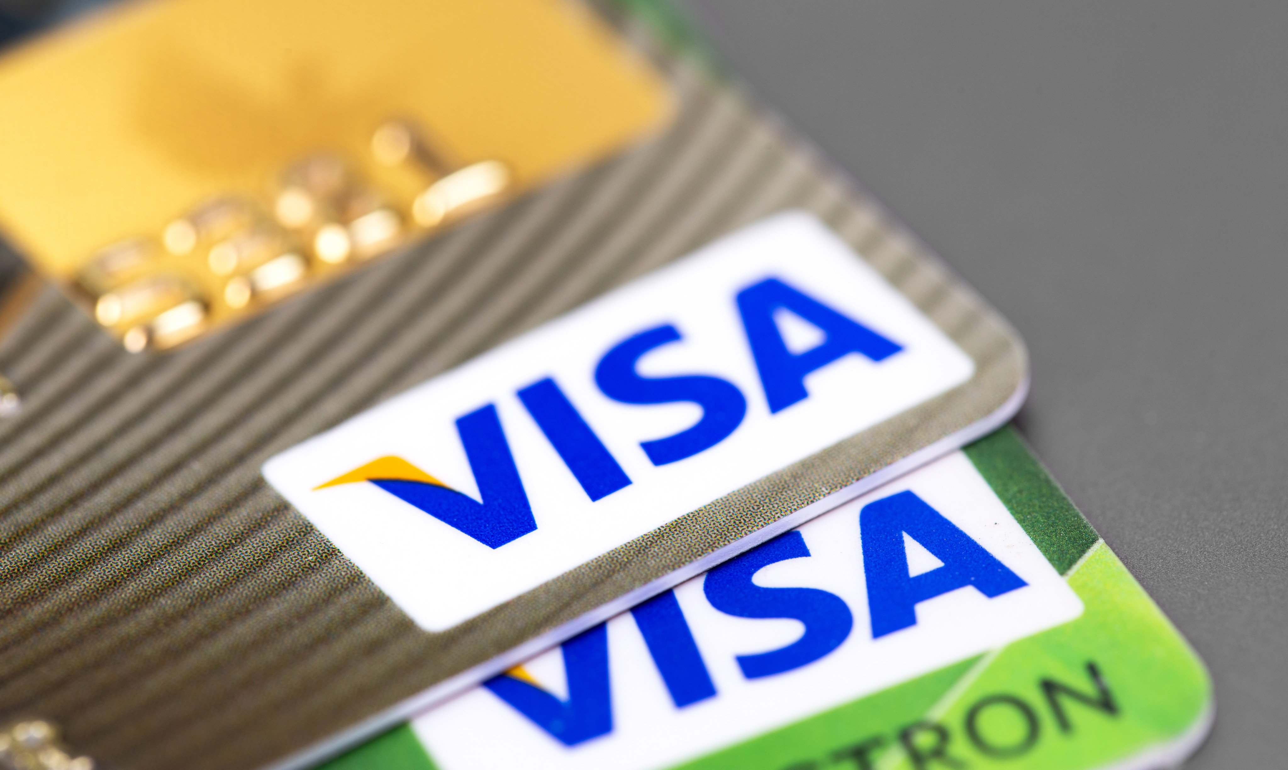 A close-up view of bank cards carrying the Visa logo. Photo: Shutterstock