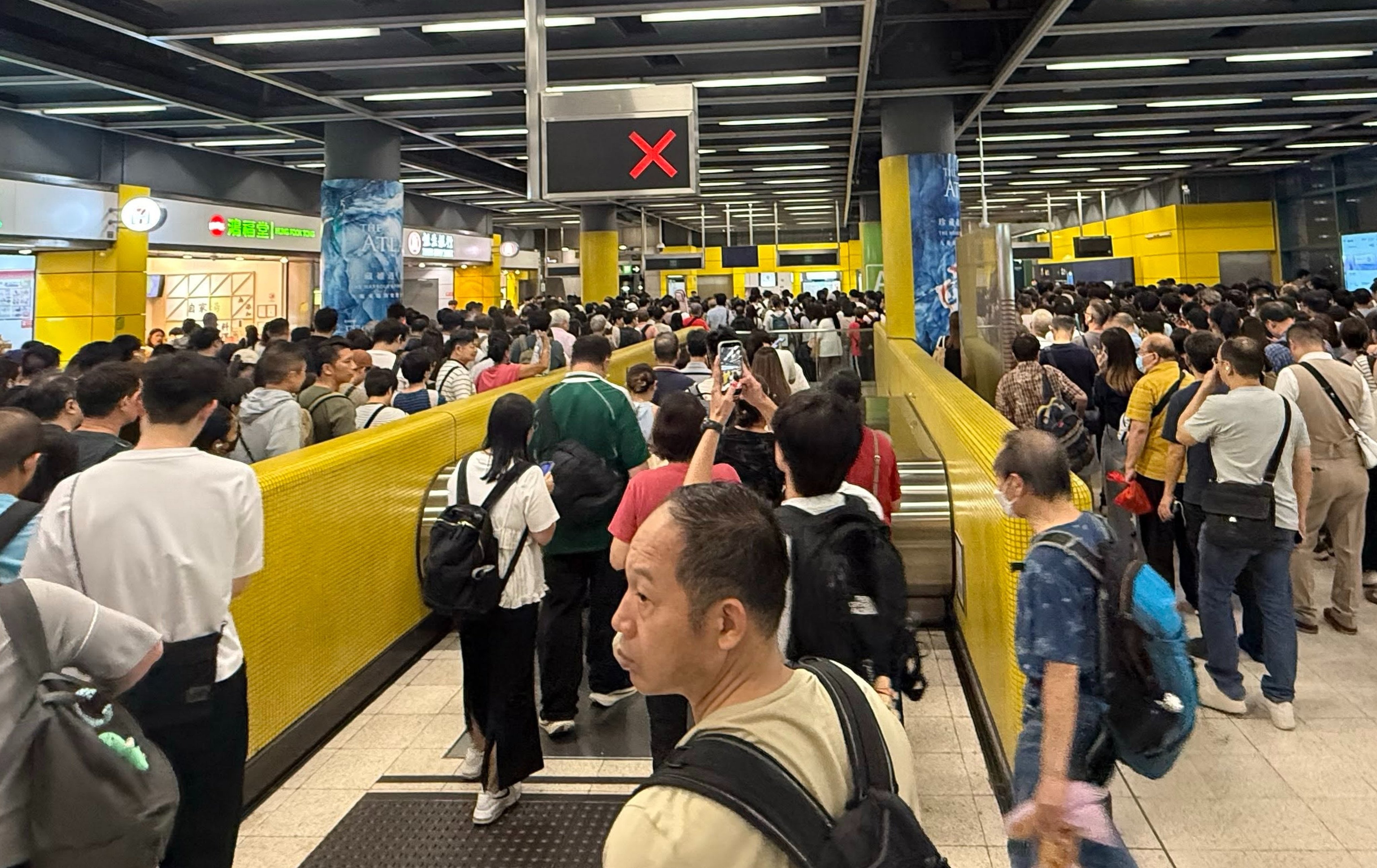 Frustrated passengers took to social media to share photos of congested concourses and platform bottlenecks, reporting long queues to exit the stations. Photo: Handout