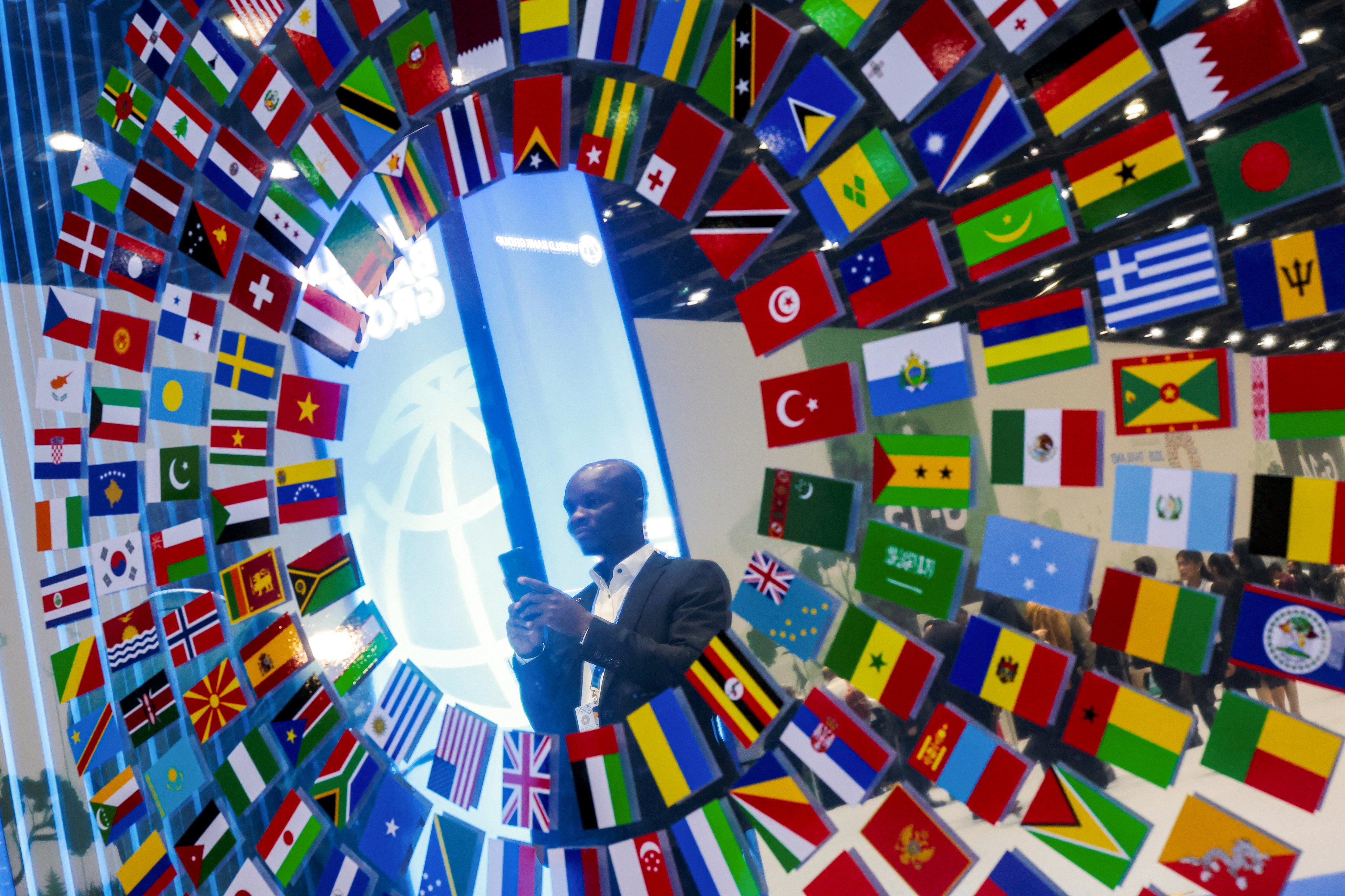 An attendee at the IMF-World Bank Annual Meetings in Bangkok. Photo: Reuters