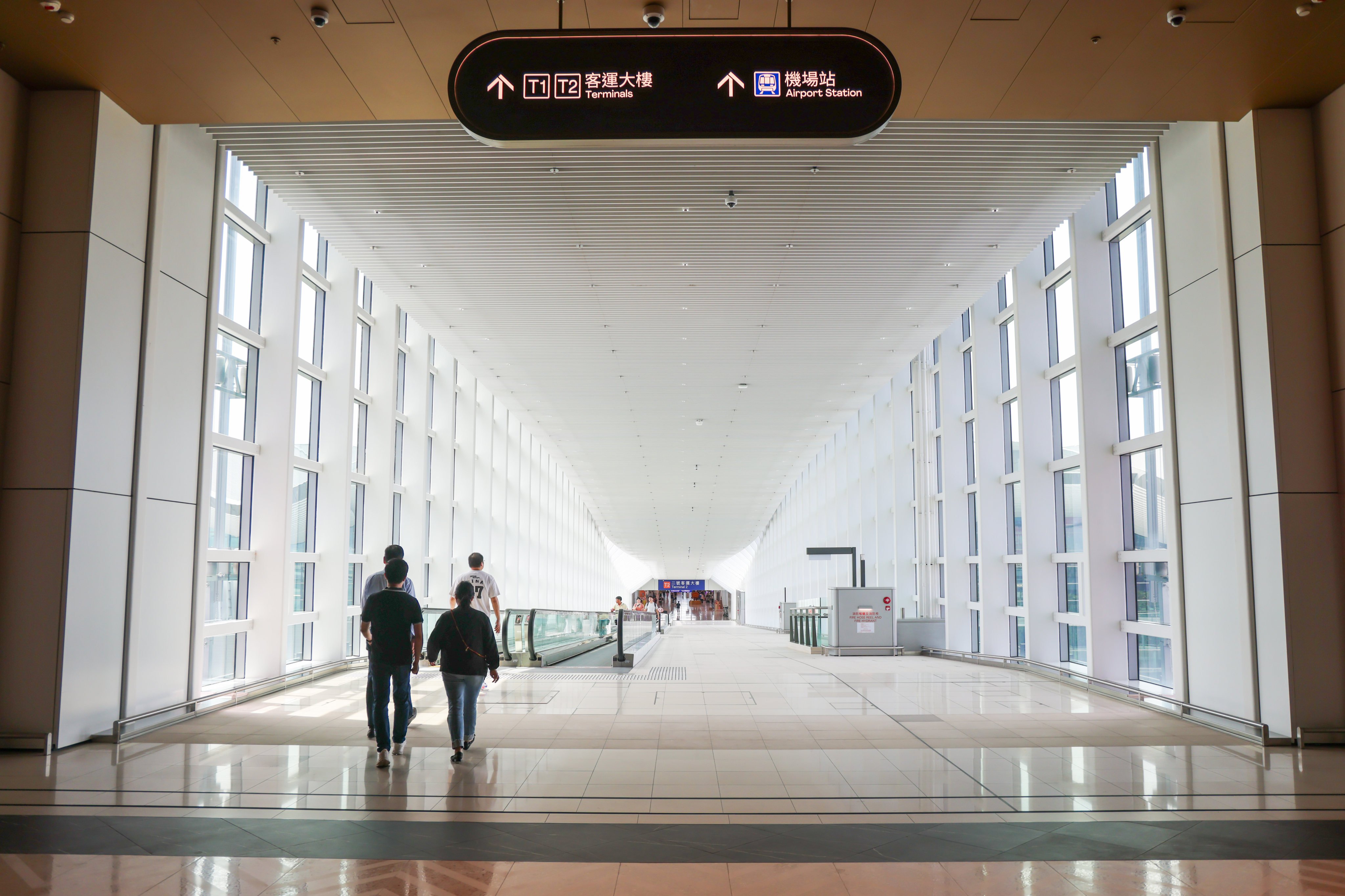 A covered footbridge connecting 11 Skies with the Hong Kong International Airport’s terminals. Photo: Silvia Siu