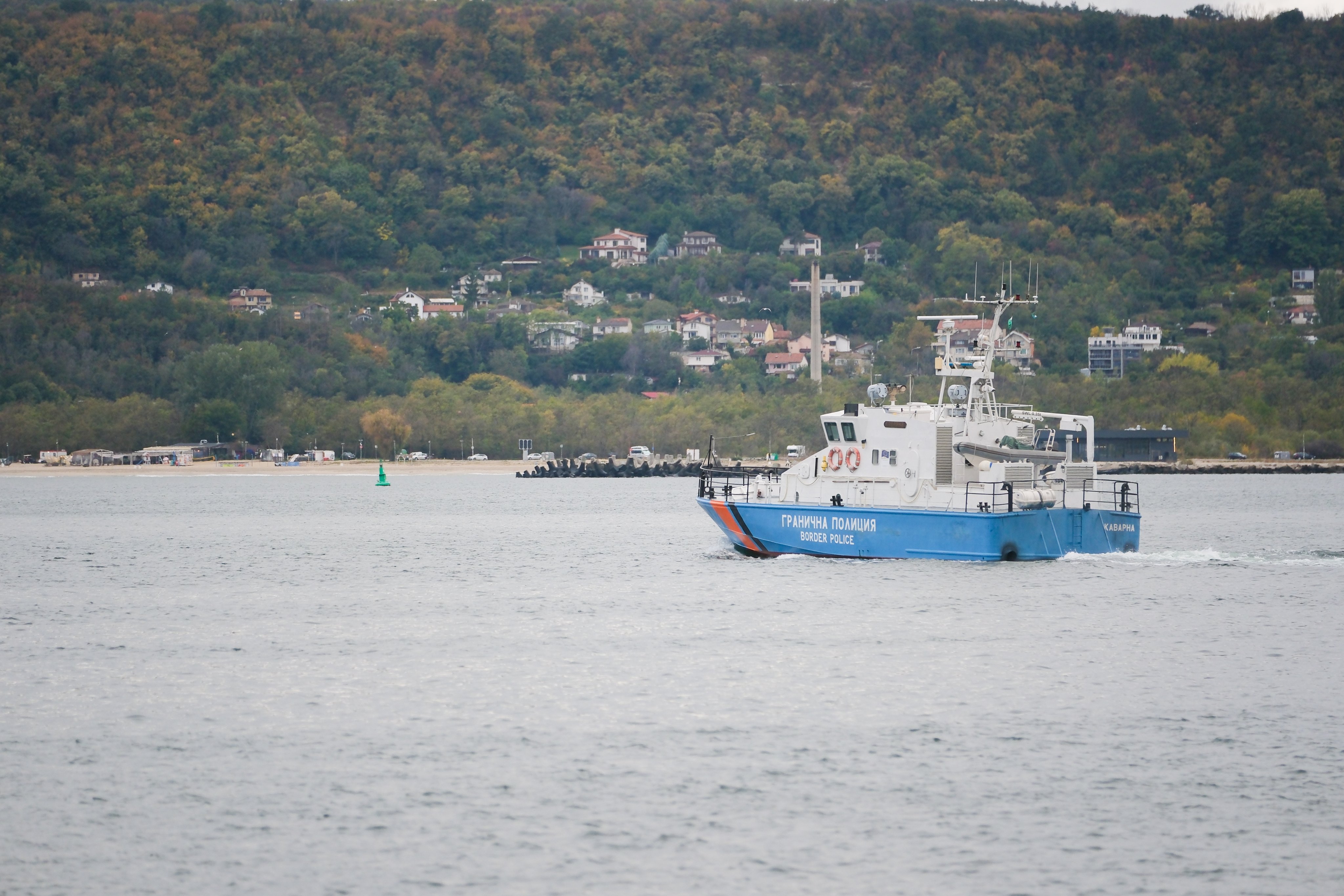 A border police boat brings rescued crew members from the drone-damaged Chelsea 3 to Varna, Bulgaria, on Tuesday. Photo: AP