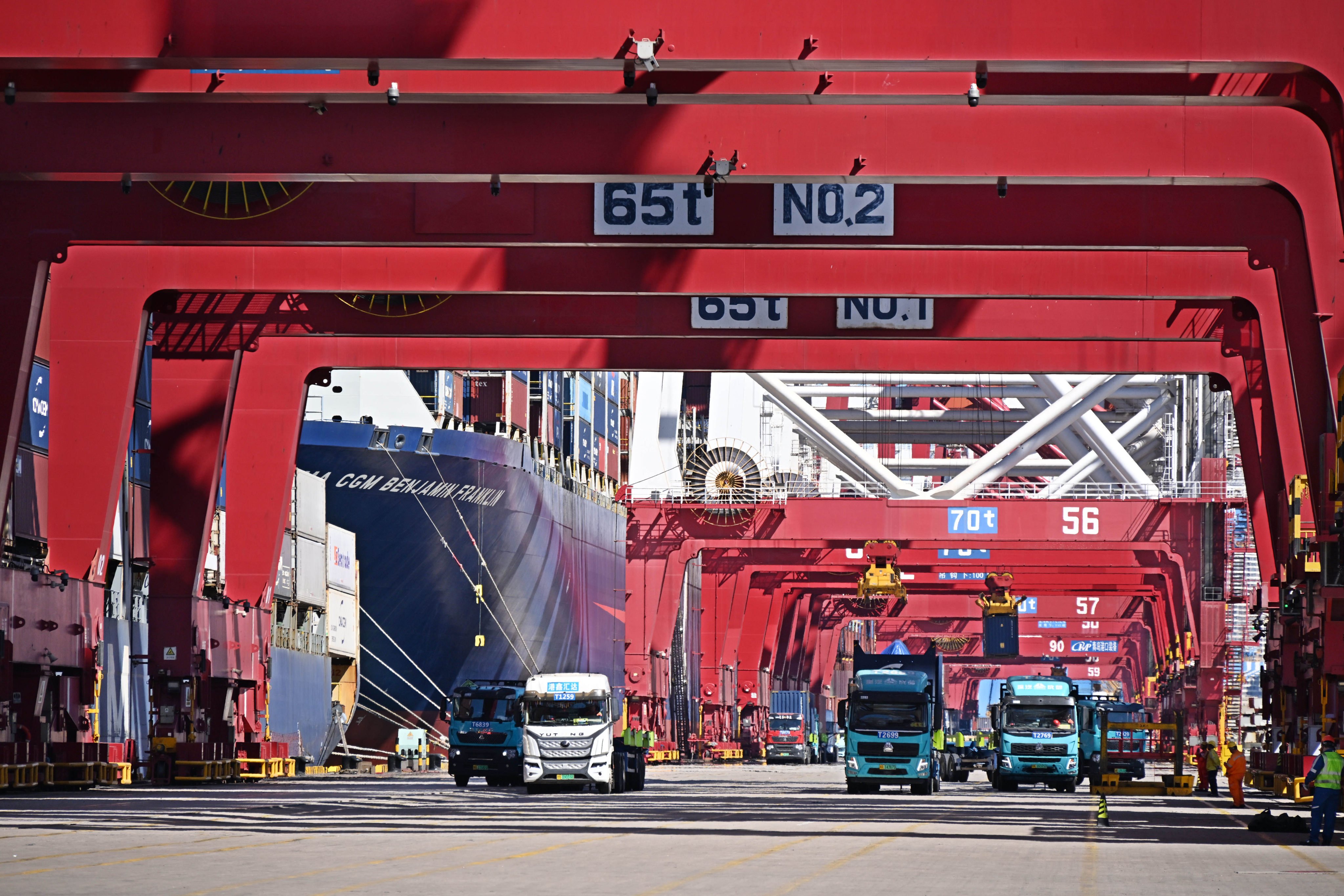 Freight trucks at Qingdao Port in east China's Shandong province on Thursday. Photo: Xinhua