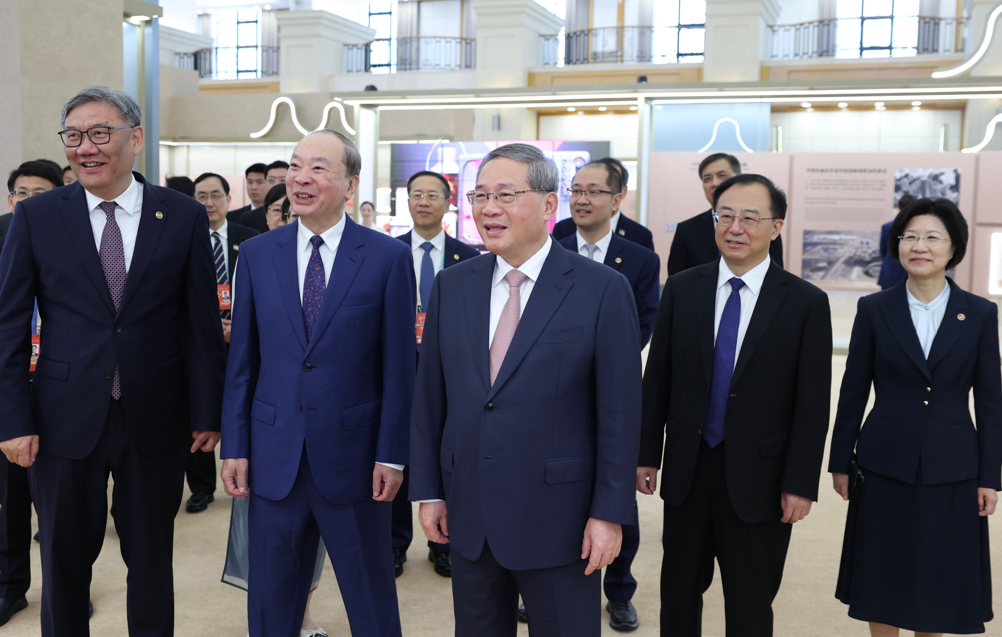 Premier Li Qiang inspects a themed exhibition marking the 70th anniversary of the Canton Fair in Guangzhou on Wednesday morning, ahead of a symposium celebrating the milestone. Photo: Xinhua